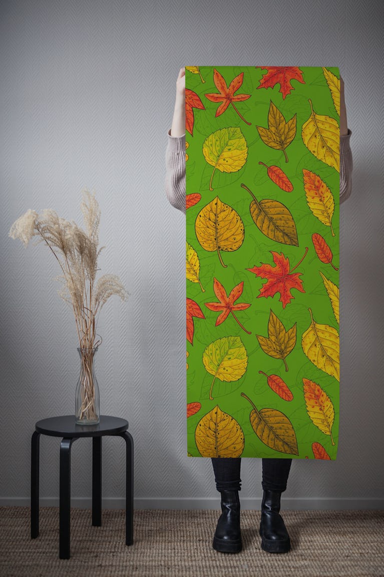 Autumn leaves on green wallpaper roll