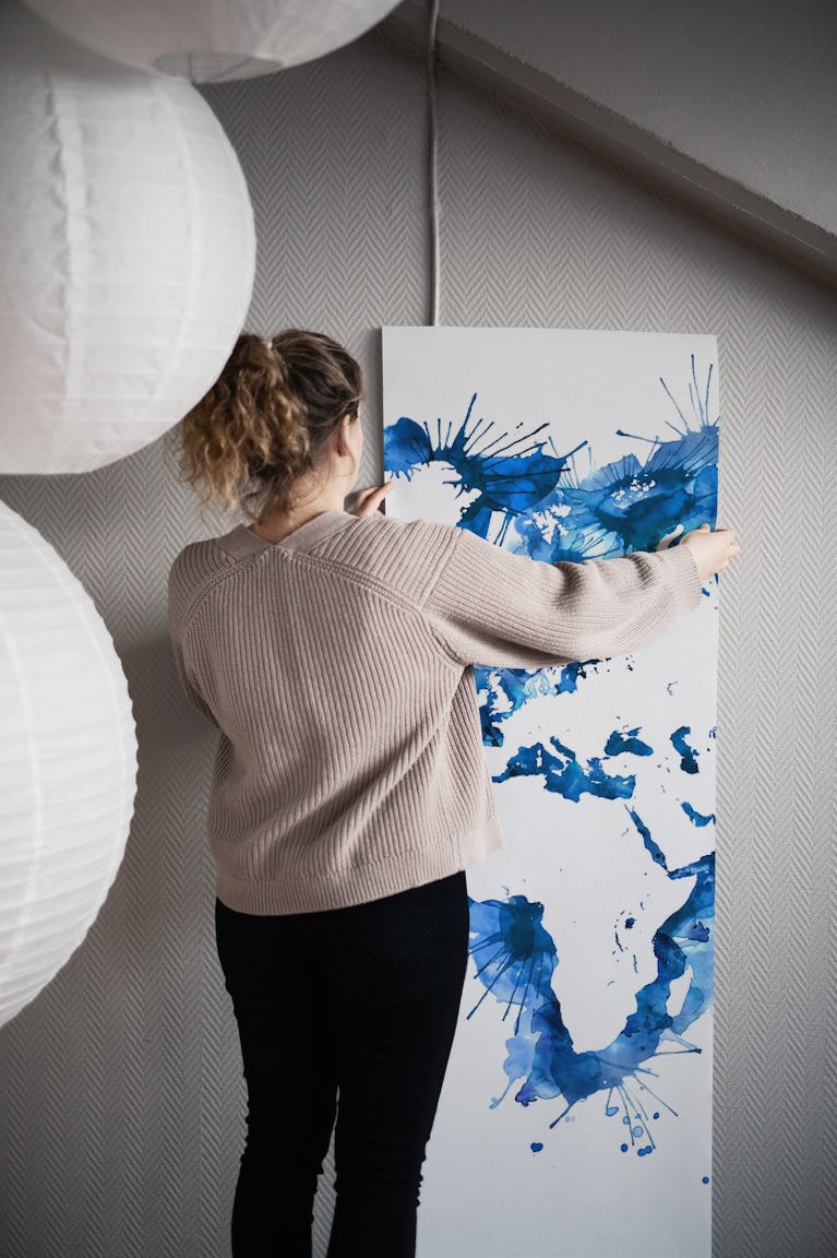 Blue watercolor splatters map wallpaper roll
