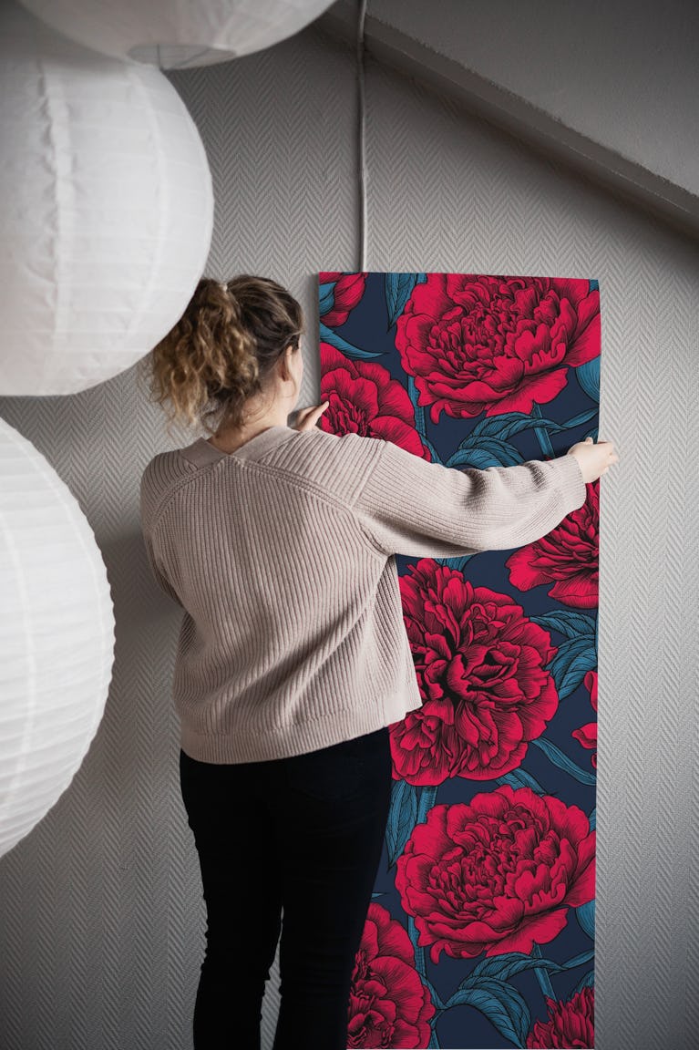 Red peony garden on dark blue wallpaper roll