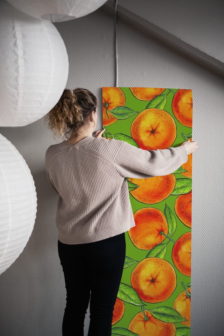 Oranges on green wallpaper roll