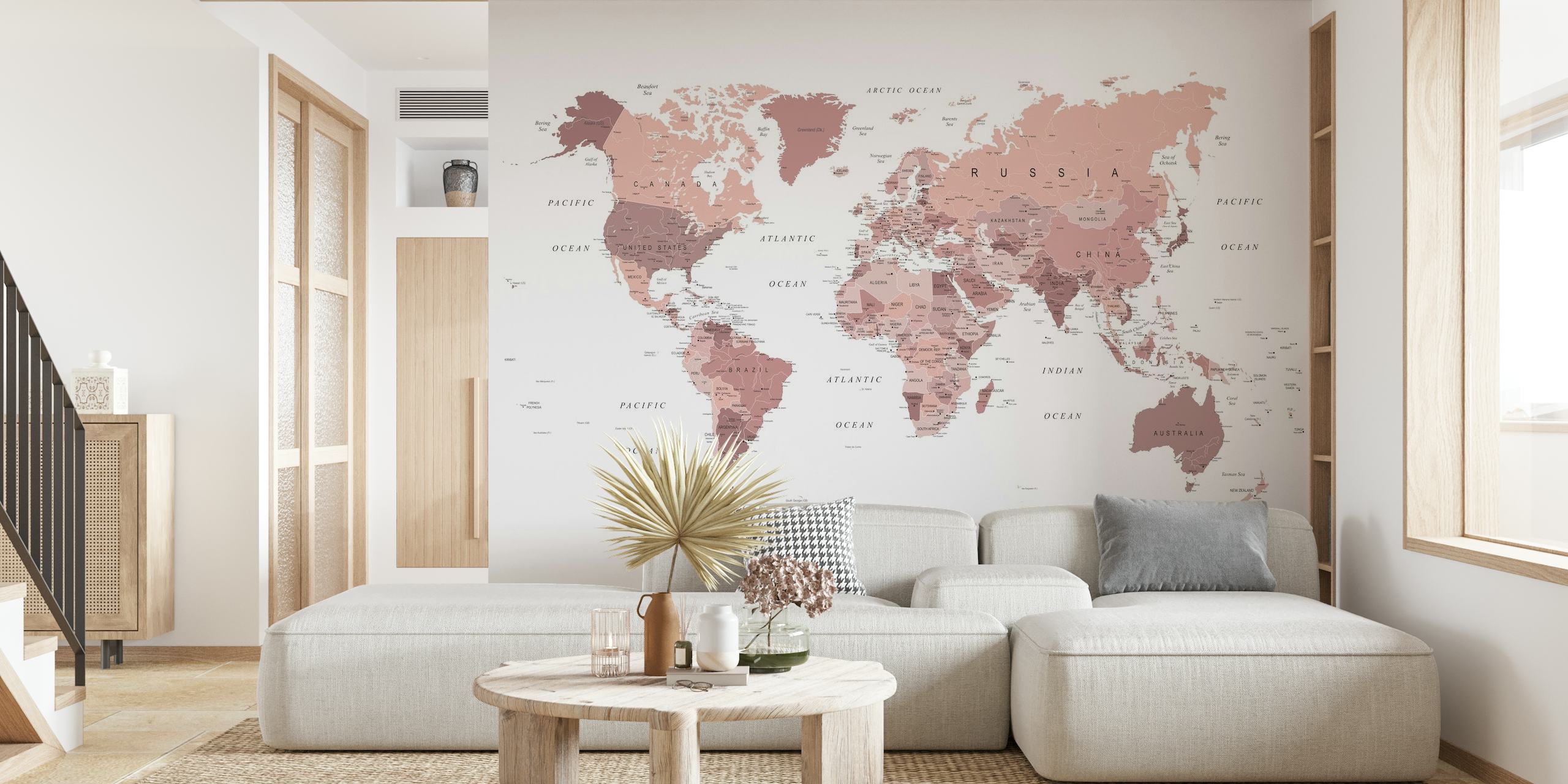 Roségouden wereldkaart muurschildering in een zacht kleurenpalet