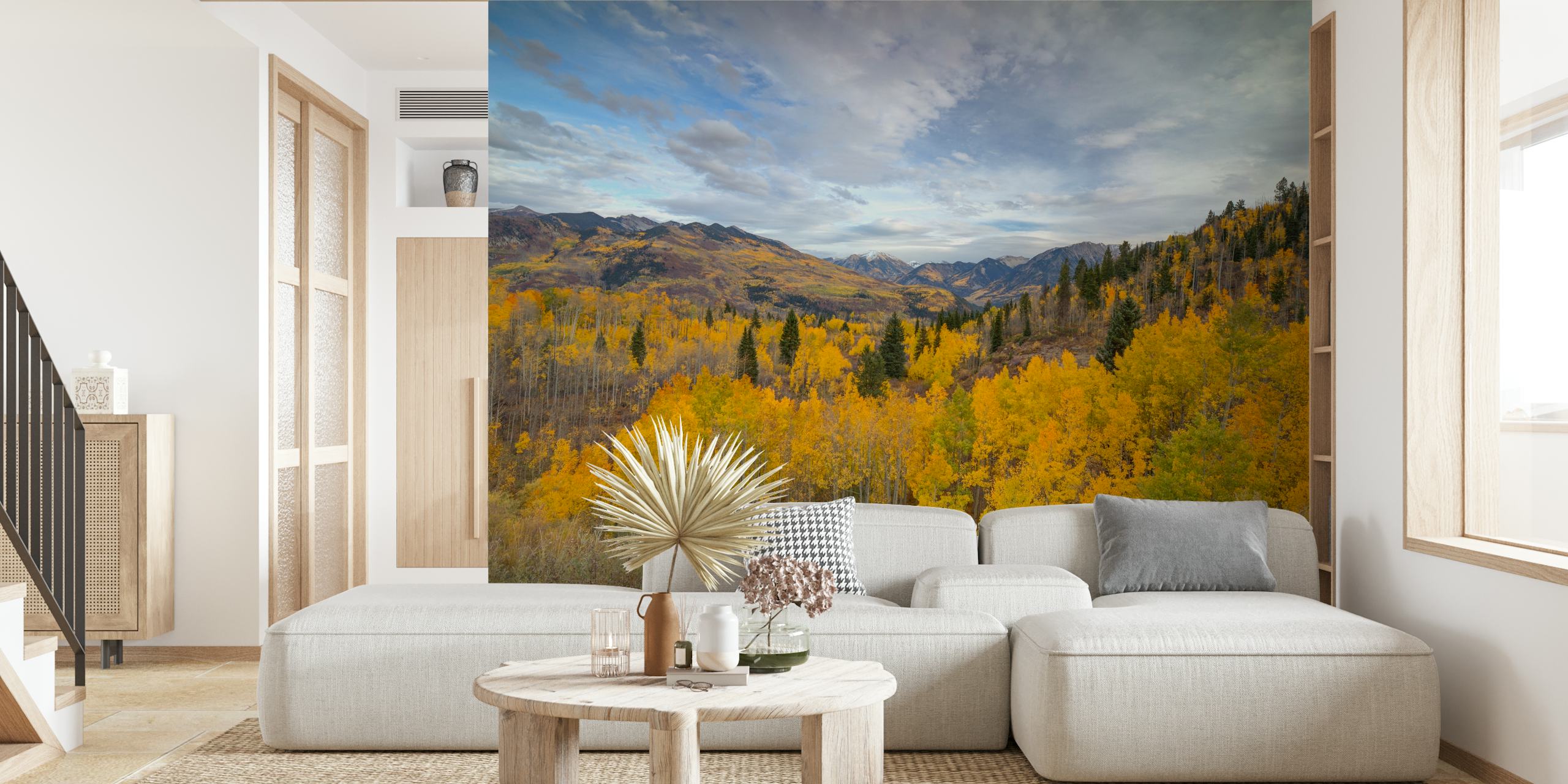 Austere mountain landscape with vibrant orange and yellow trees wallpaper
