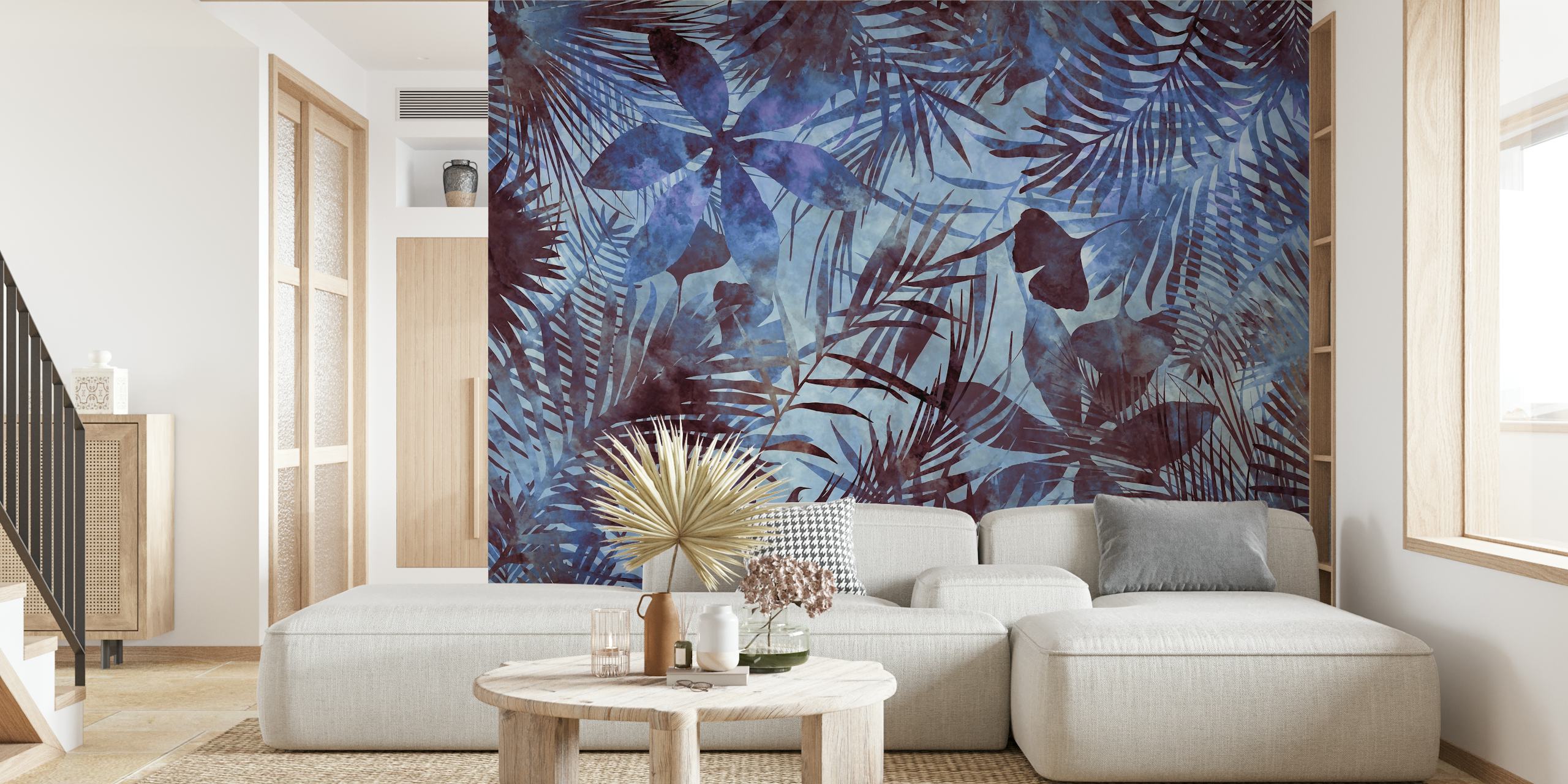 Blue tropical jungle wallpaper with large foliage and floral patterns