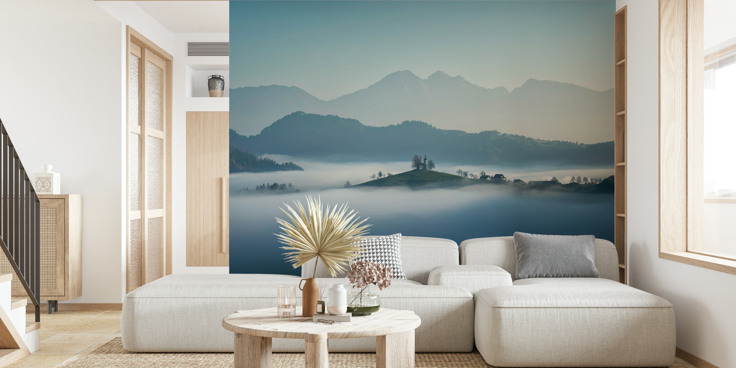 Mountain landscape with misty hills and blue hues wallpaper