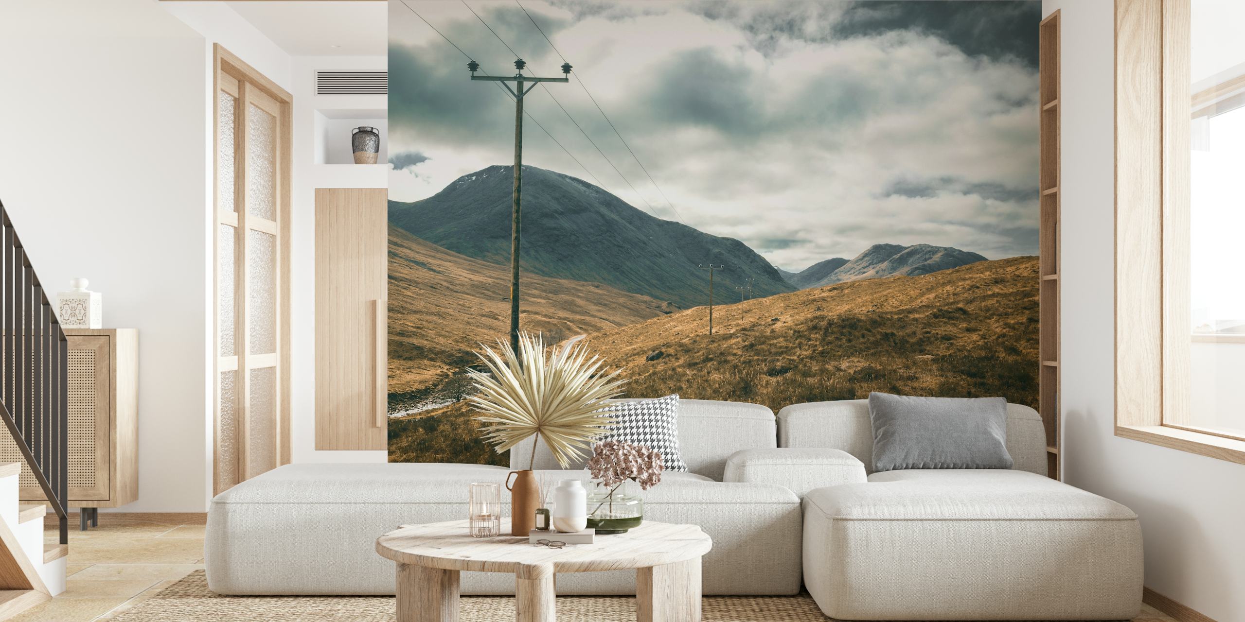 Winding road landscape in Scottish Highlands with gray clouds and mountains wallpaper