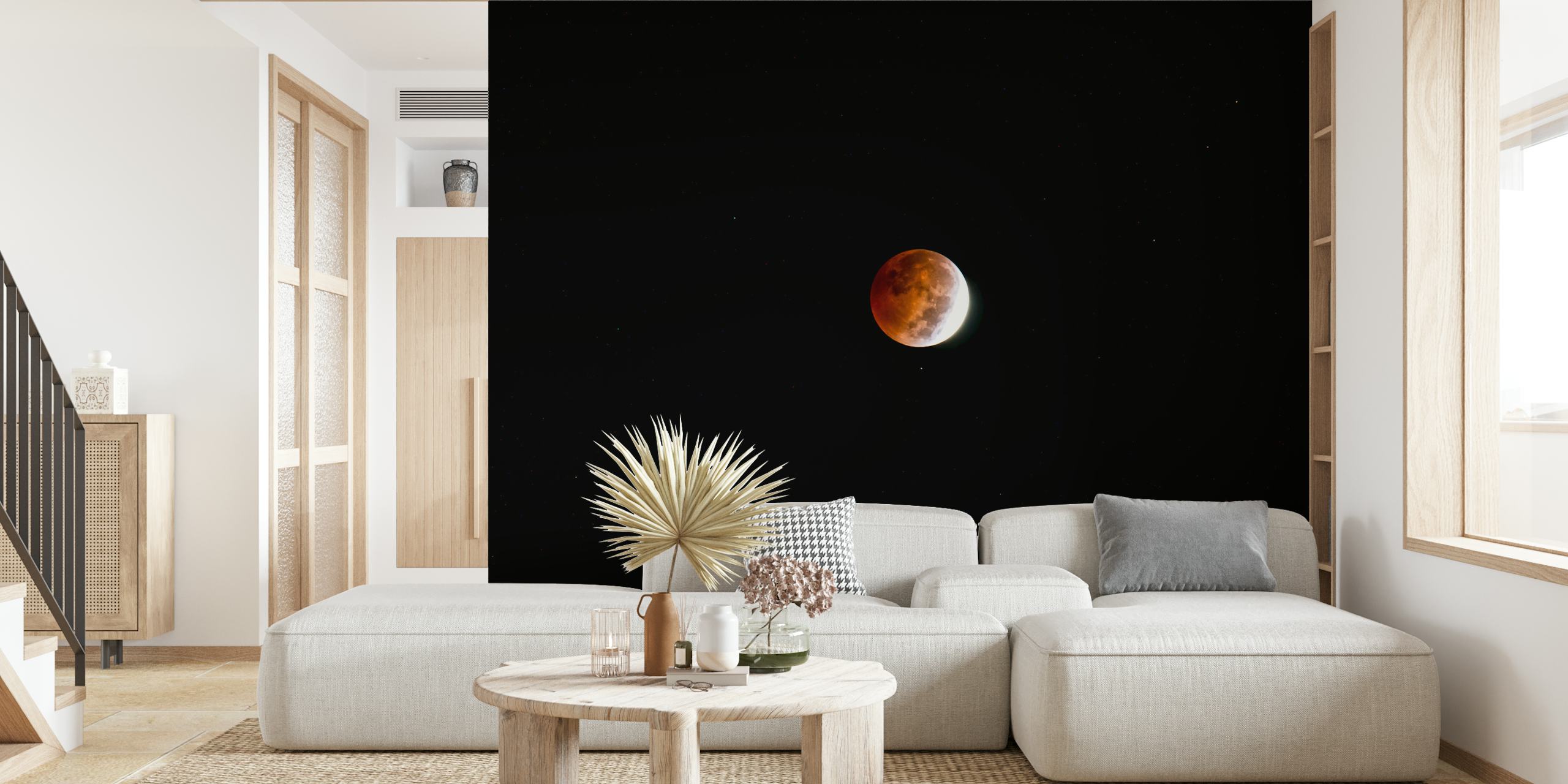 Blood moon eclipse with red hues against a black background wallpaper