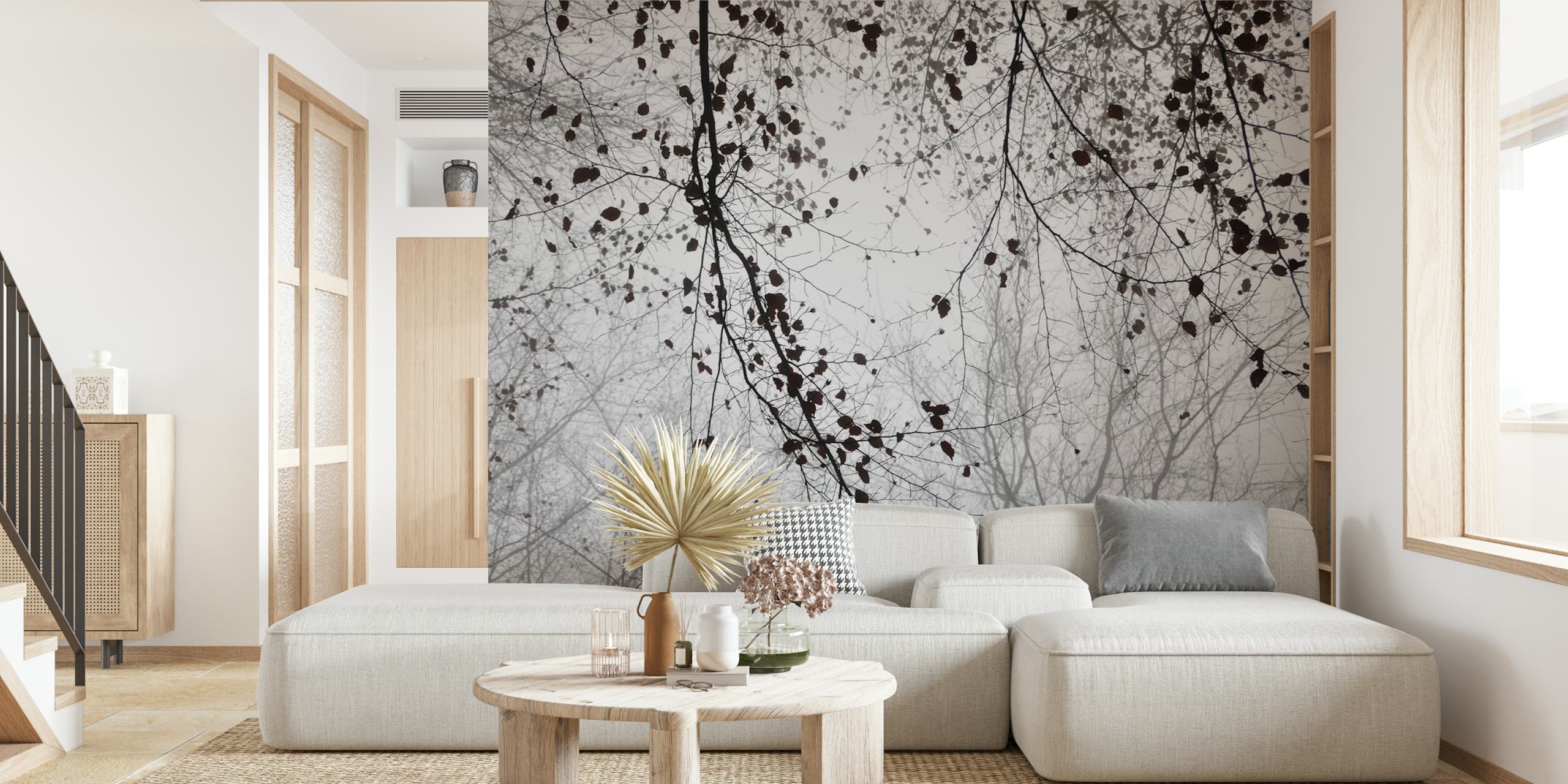 Black and white silhouette wall mural of leaves and branches