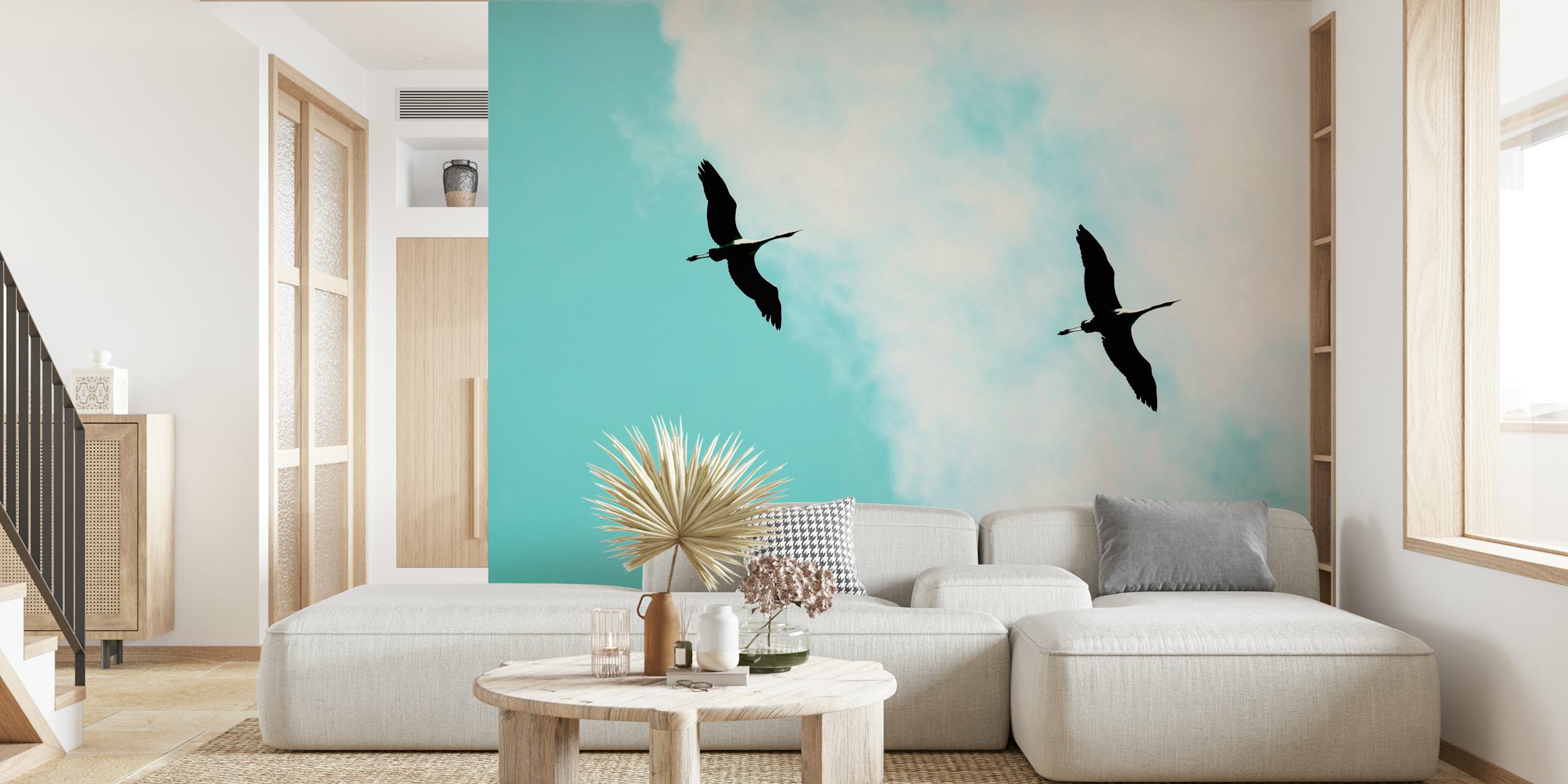 Silhouettes of cranes flying against a blue sky wallpaper