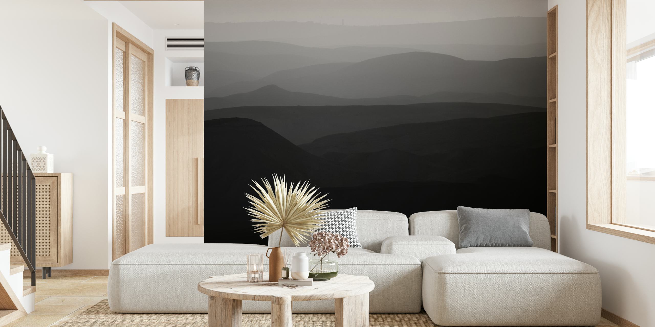 Svart og hvitt veggmaleri som viser de bølgende åsene i Judea-ørkenen