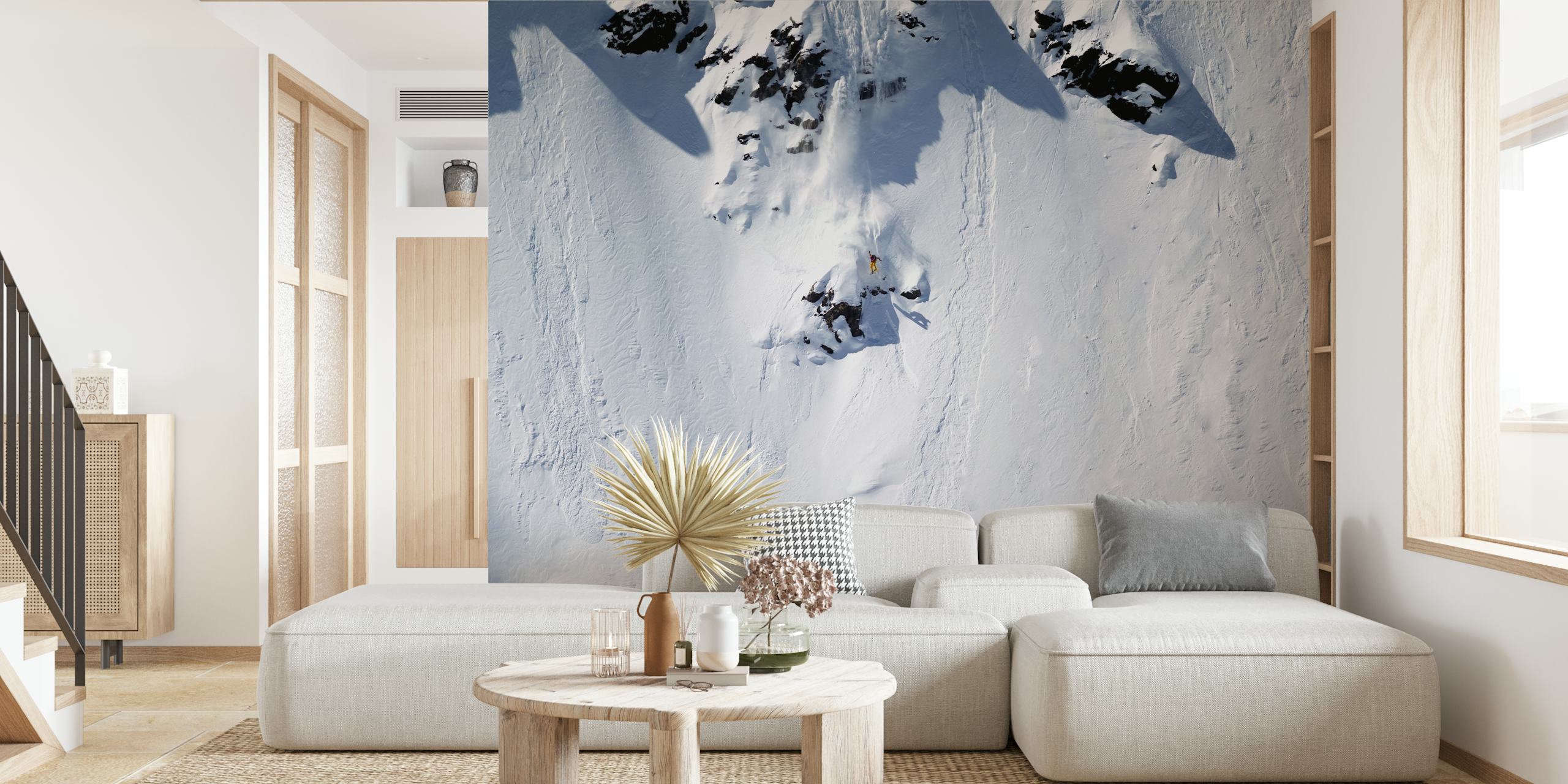 Snowy mountain landscape with rocky peaks and smooth snow wallpaper