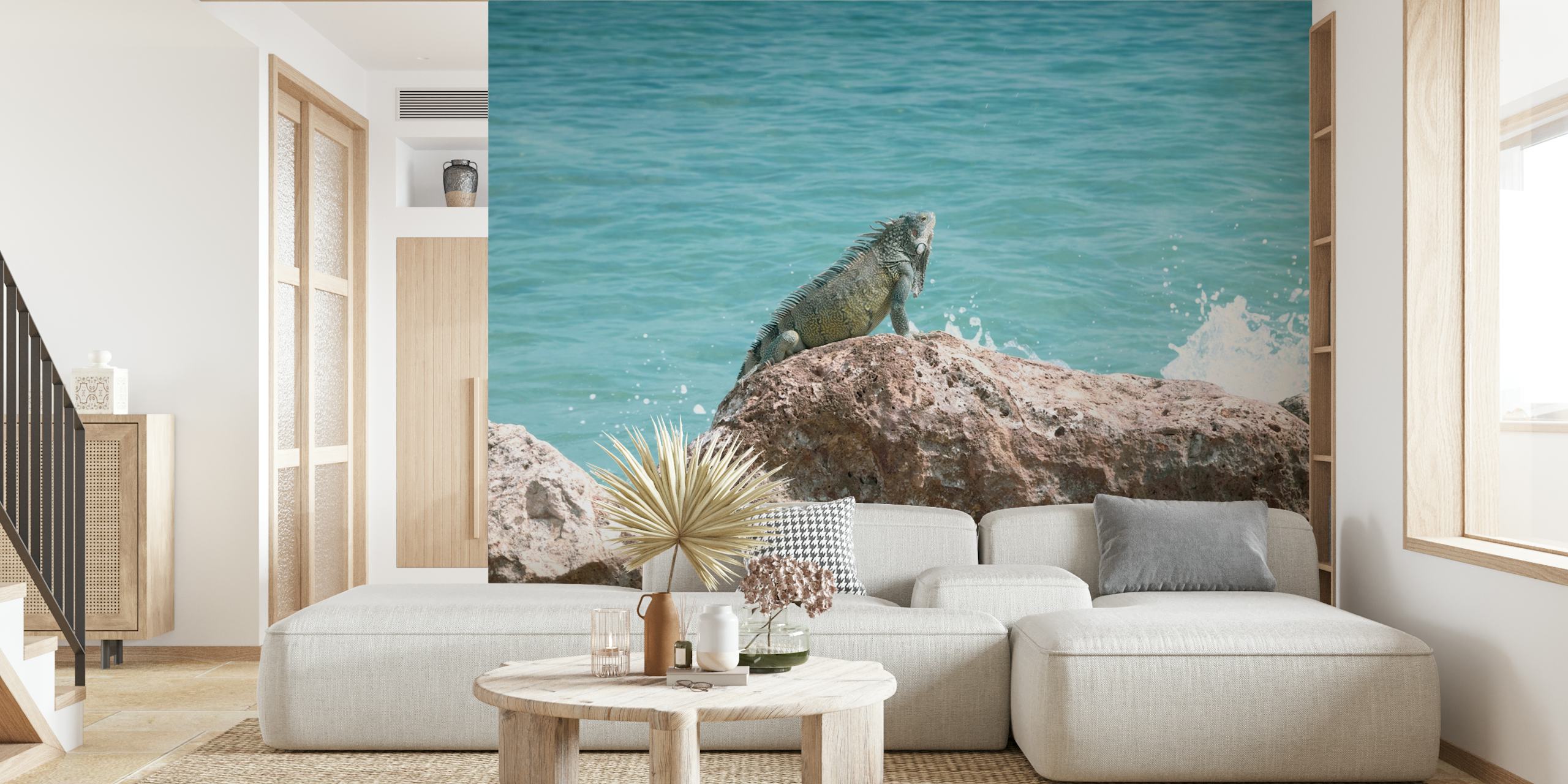 Iguana on rock by clear blue ocean water wallpaper