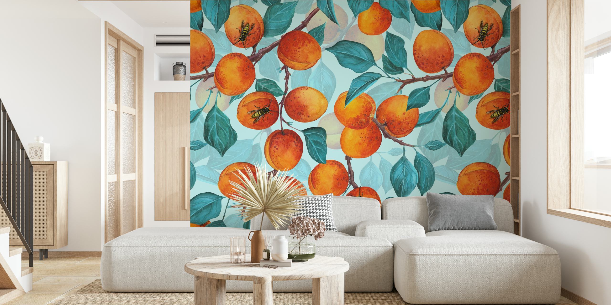 Apricot fruits and green leaves on a light blue background wallpaper