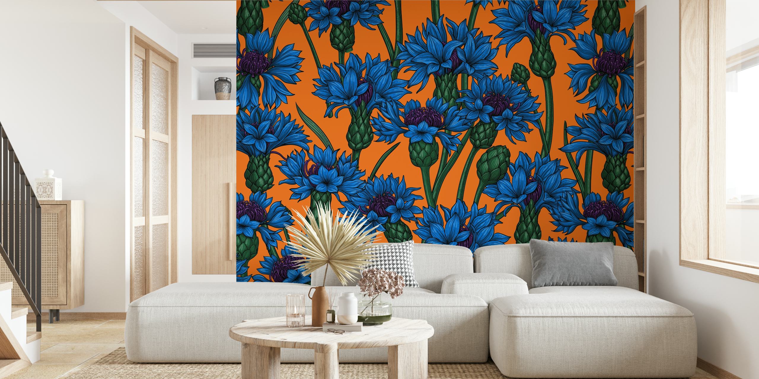 Blue cornflower floral wallpaper on an orange background