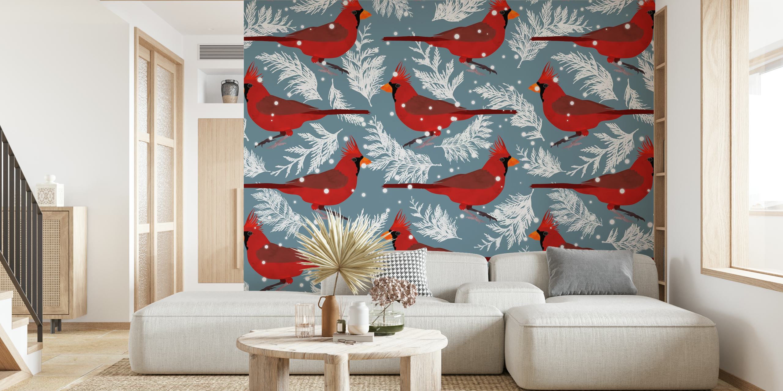 Red cardinals on white branching leaves against a blue background wallpaper