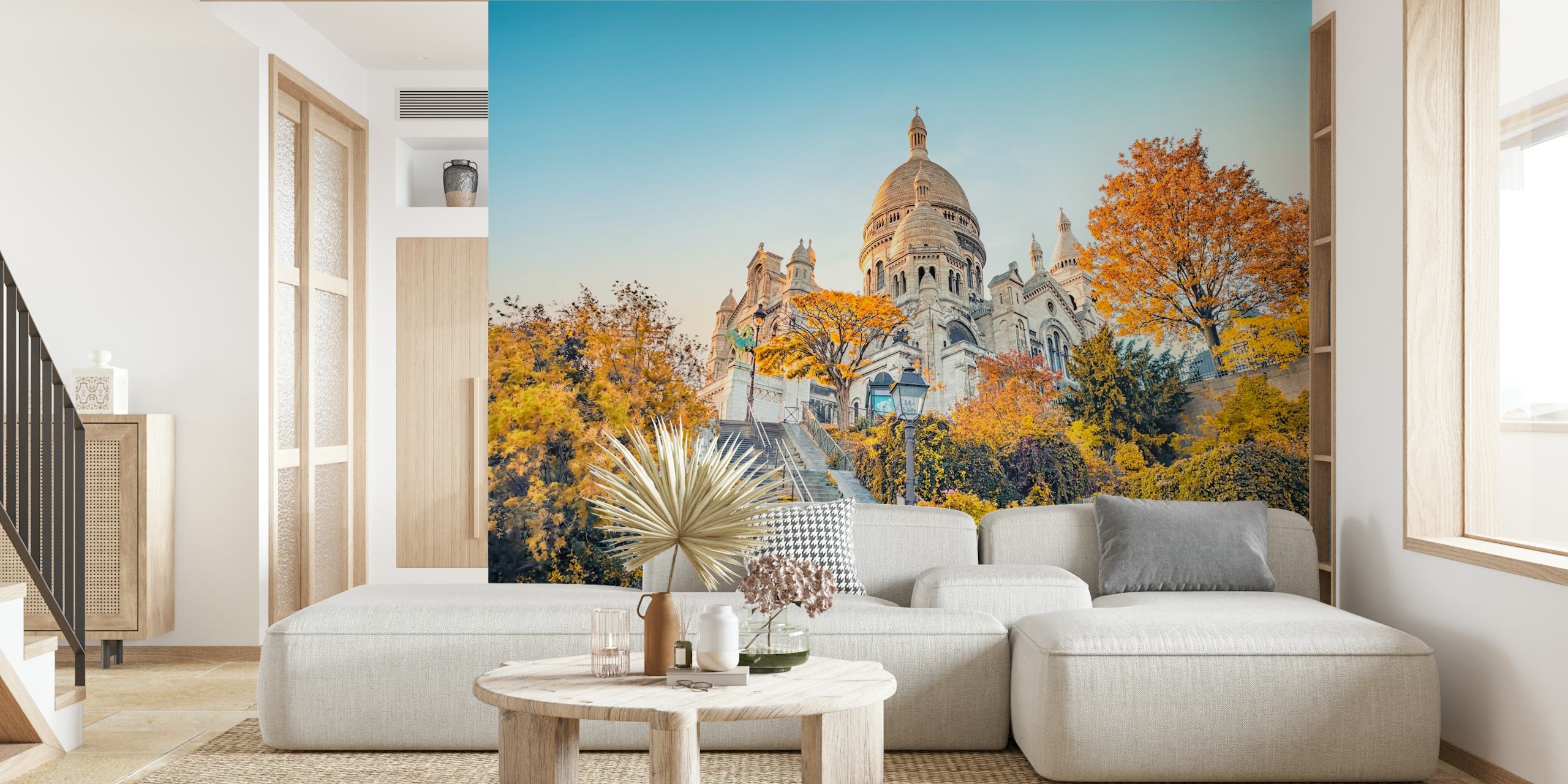 Montmartre autumn scene with golden trees and a cathedral wall mural