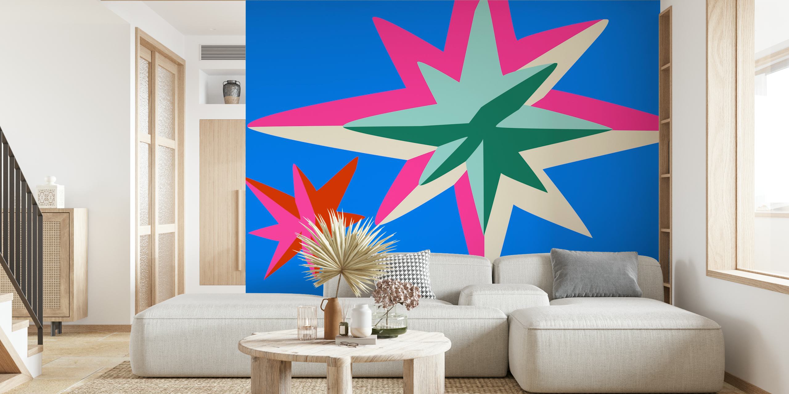 Vintage Retro Space muurschildering met opvallende geometrische sterren in roze, groenblauw en groen tegen een helderblauwe achtergrond