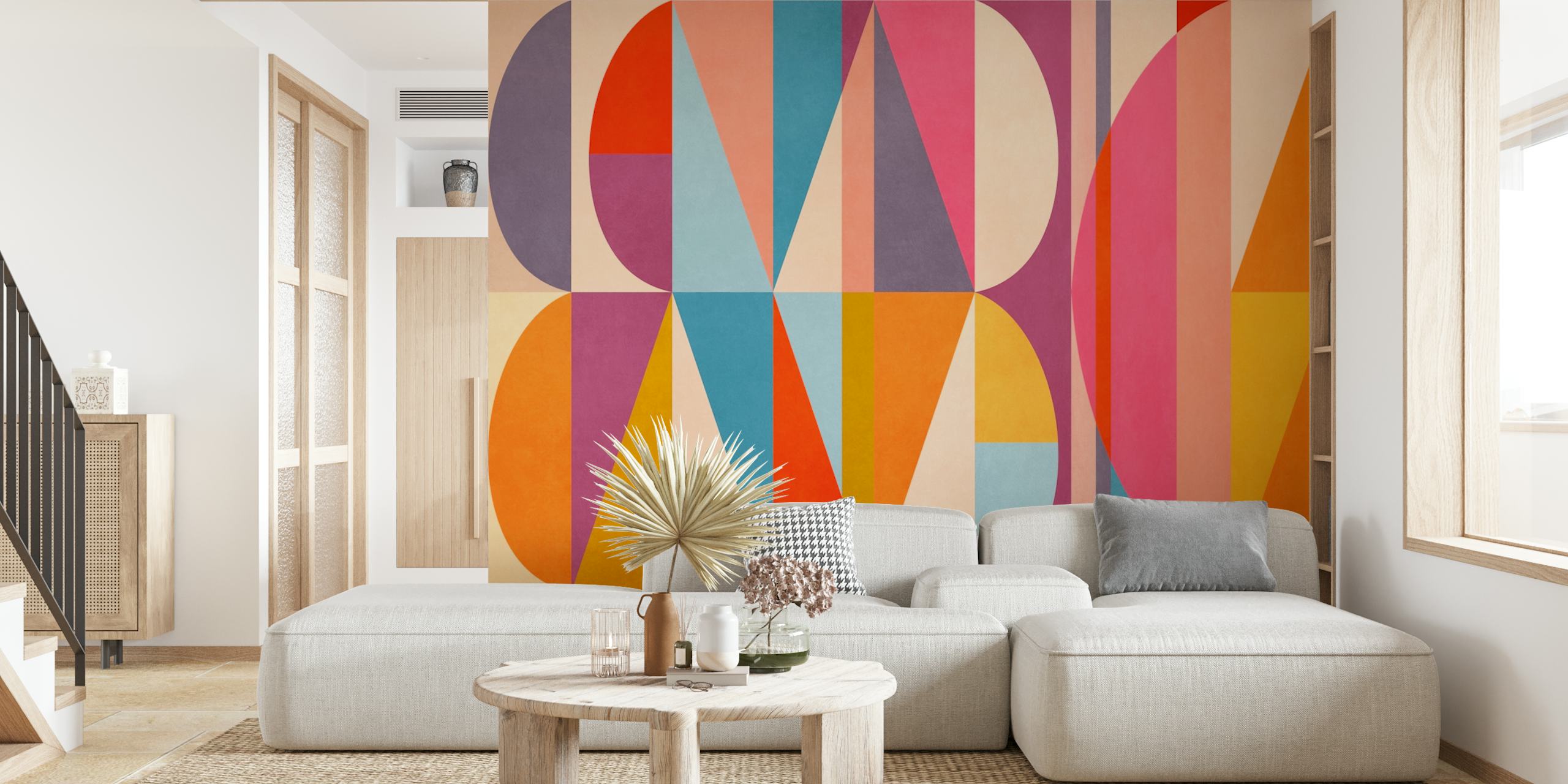 Colorful geometric shapes in pink, blue, yellow, and orange wallpaper