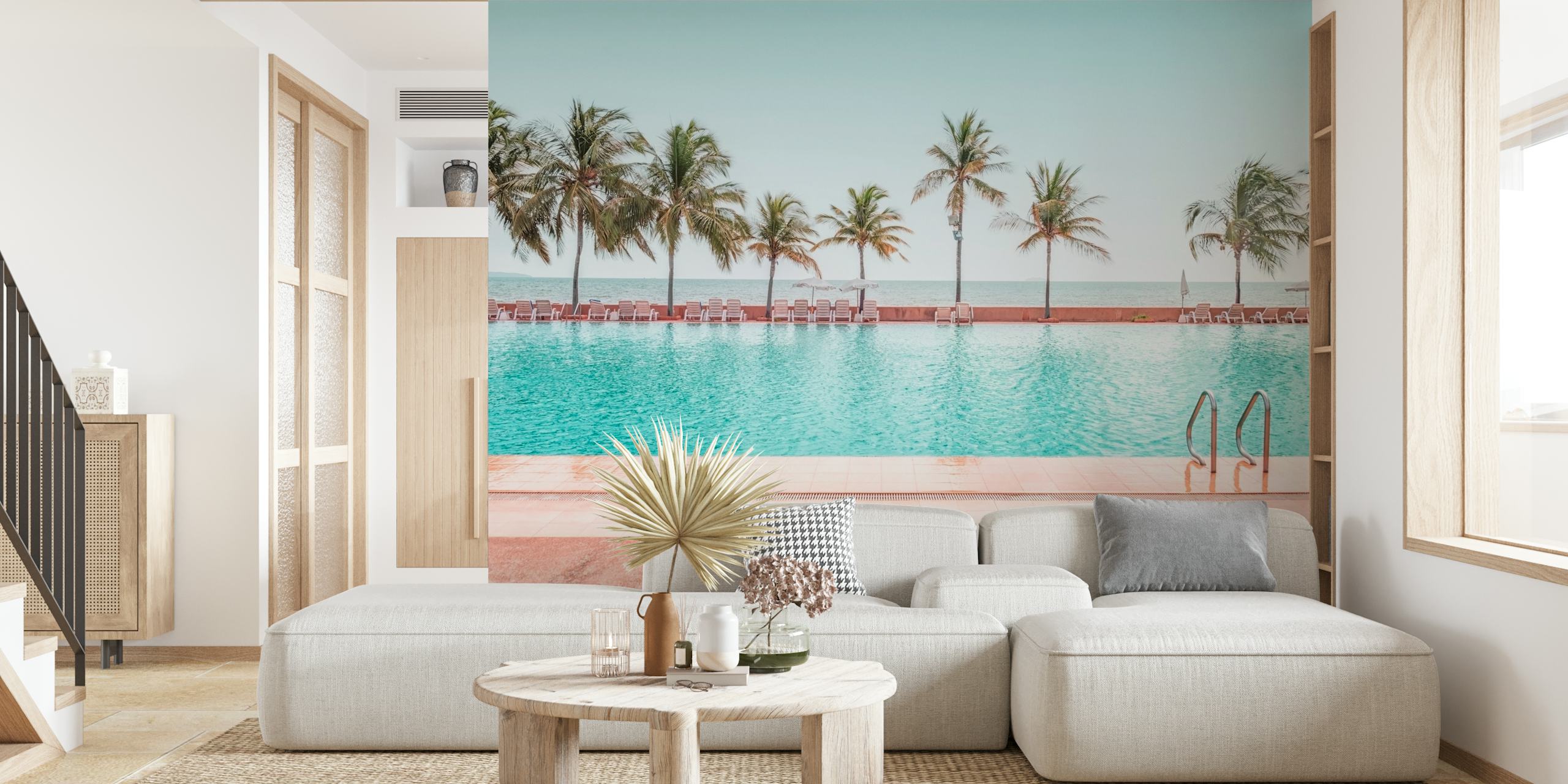 Tropical pool and beach scene wallpaper with blue hues and palm trees