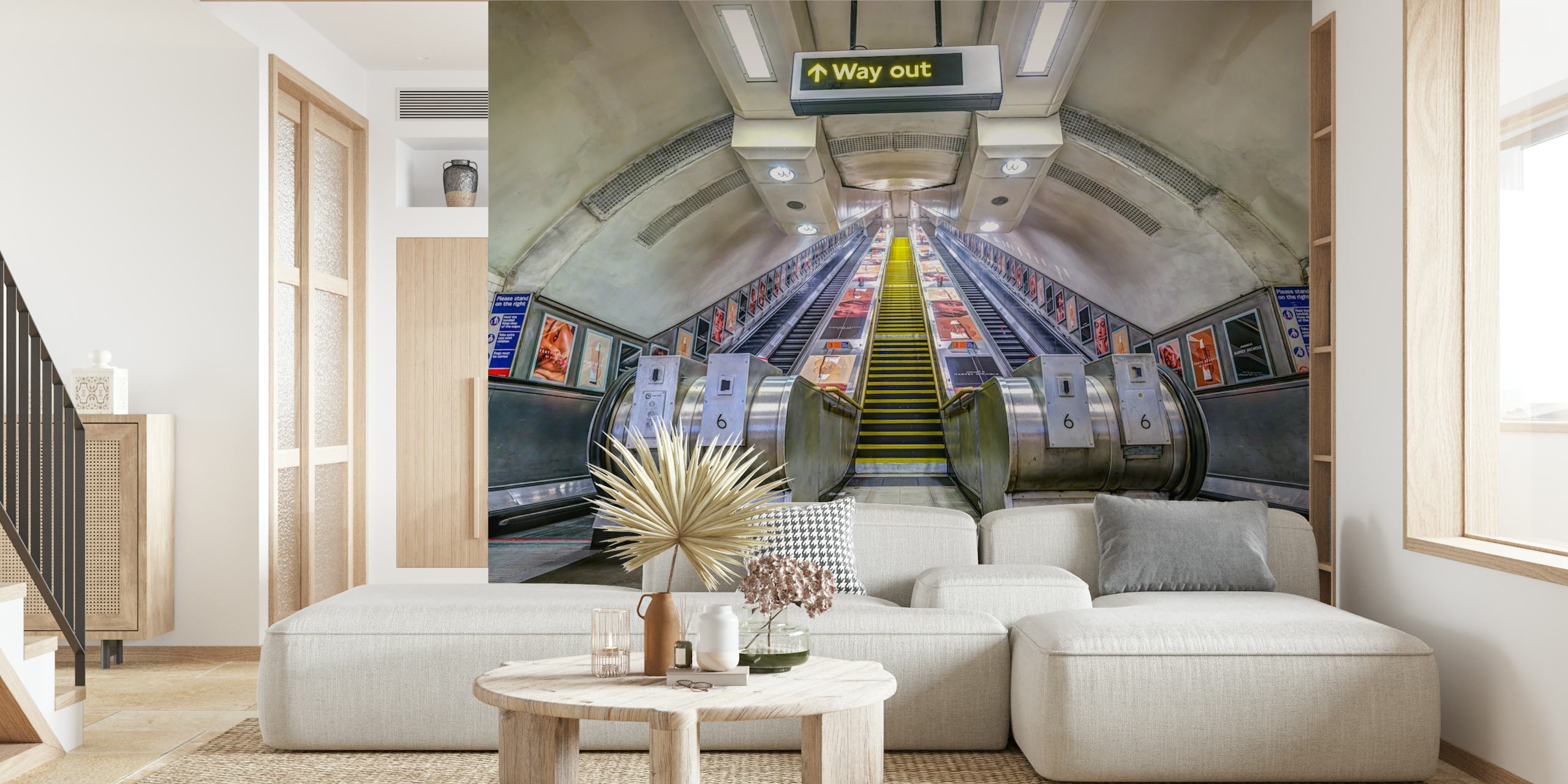 Escalator in underground station with vibrant murals wallpaper