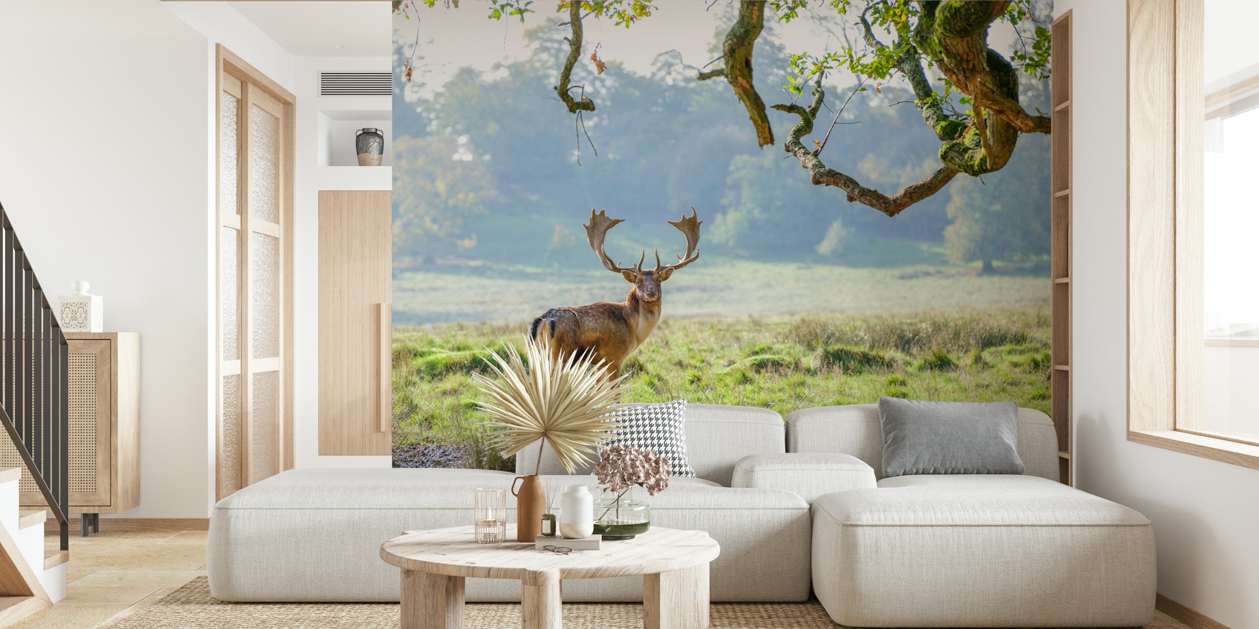 Deer in a lush green landscape with trees wallpaper
