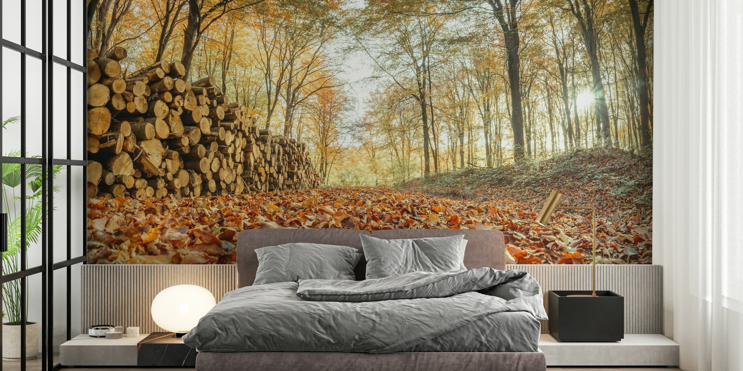 A cozy autumn forest scene with a pile of logs and a blanket of fallen leaves