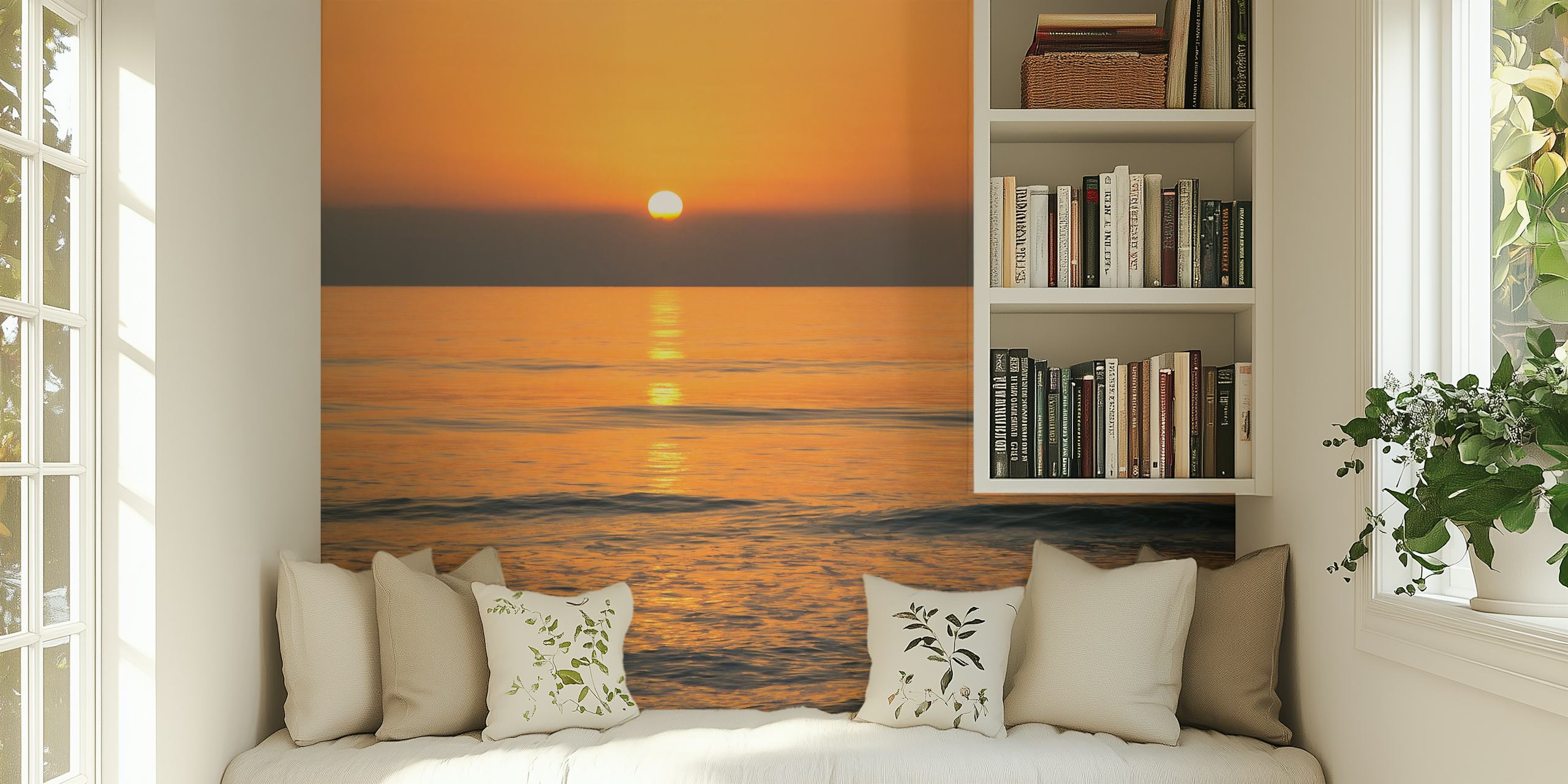 Sunset over water with warm orange hues wallpaper