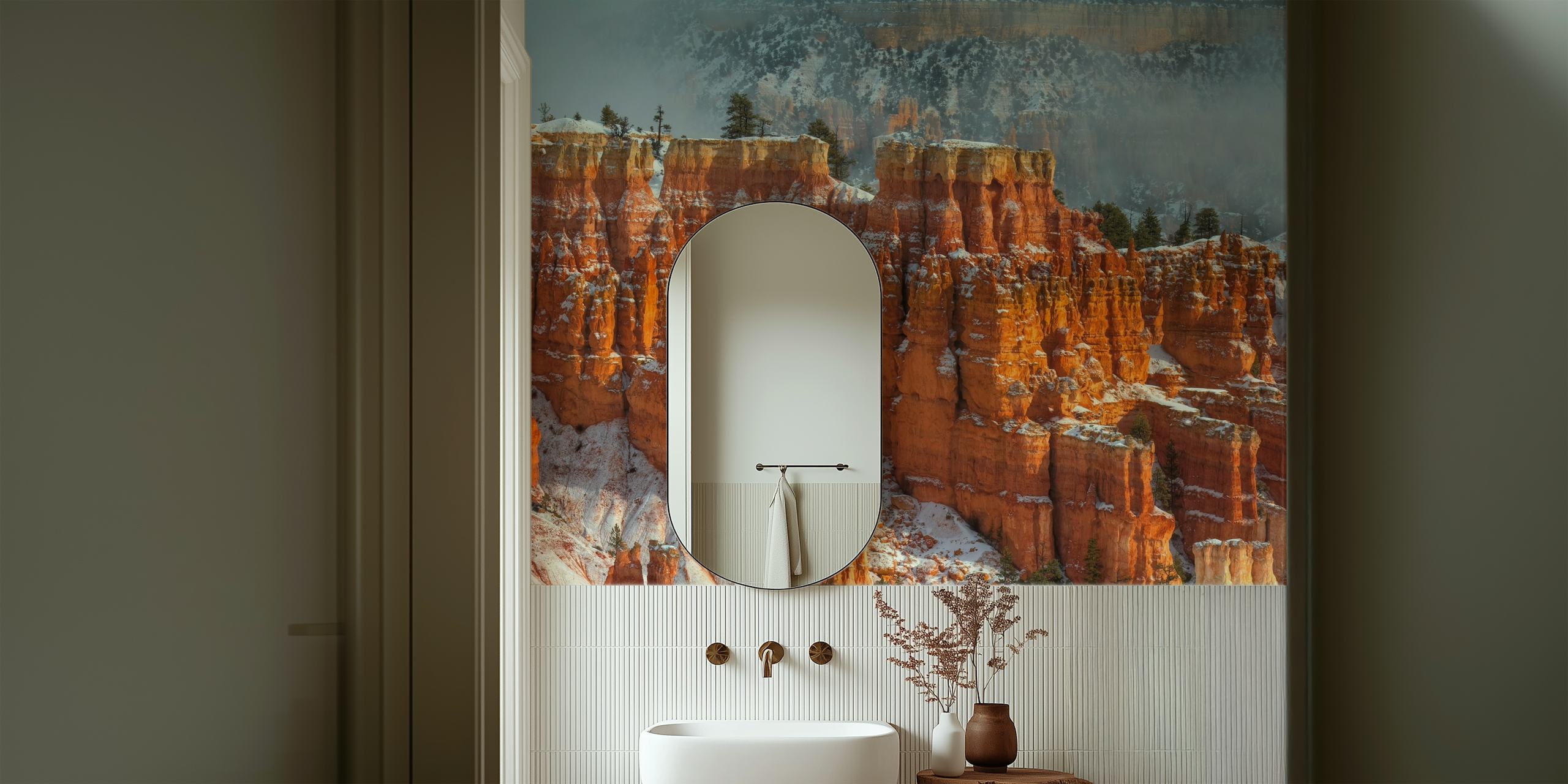 Orange rock formations with snow accents wallpaper