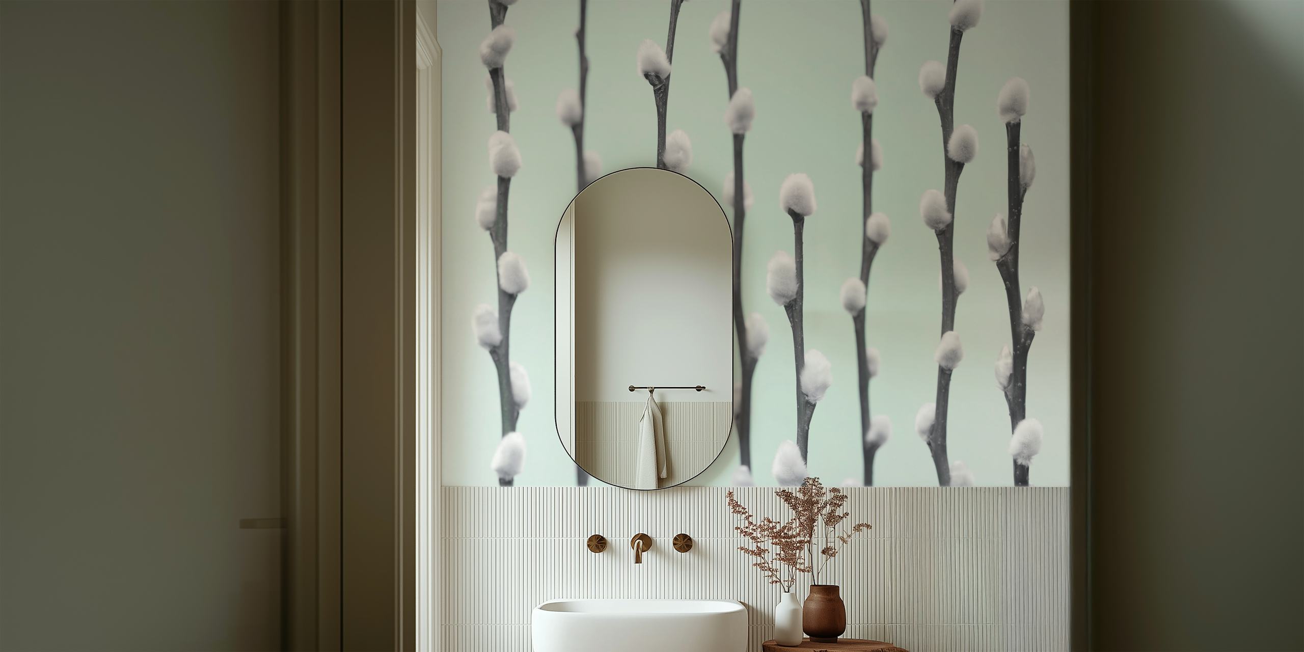 White pussy willow twigs with fluffy buds on light mint wallpaper
