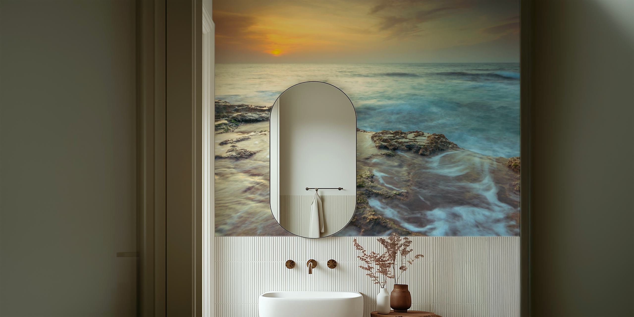 Ocean sunset with waves crashing on rocky shore wallpaper