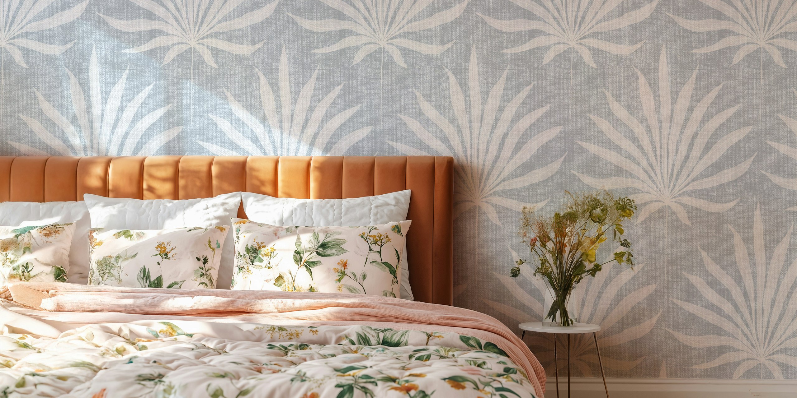 Palm leaves in white over soft blue background wallpaper