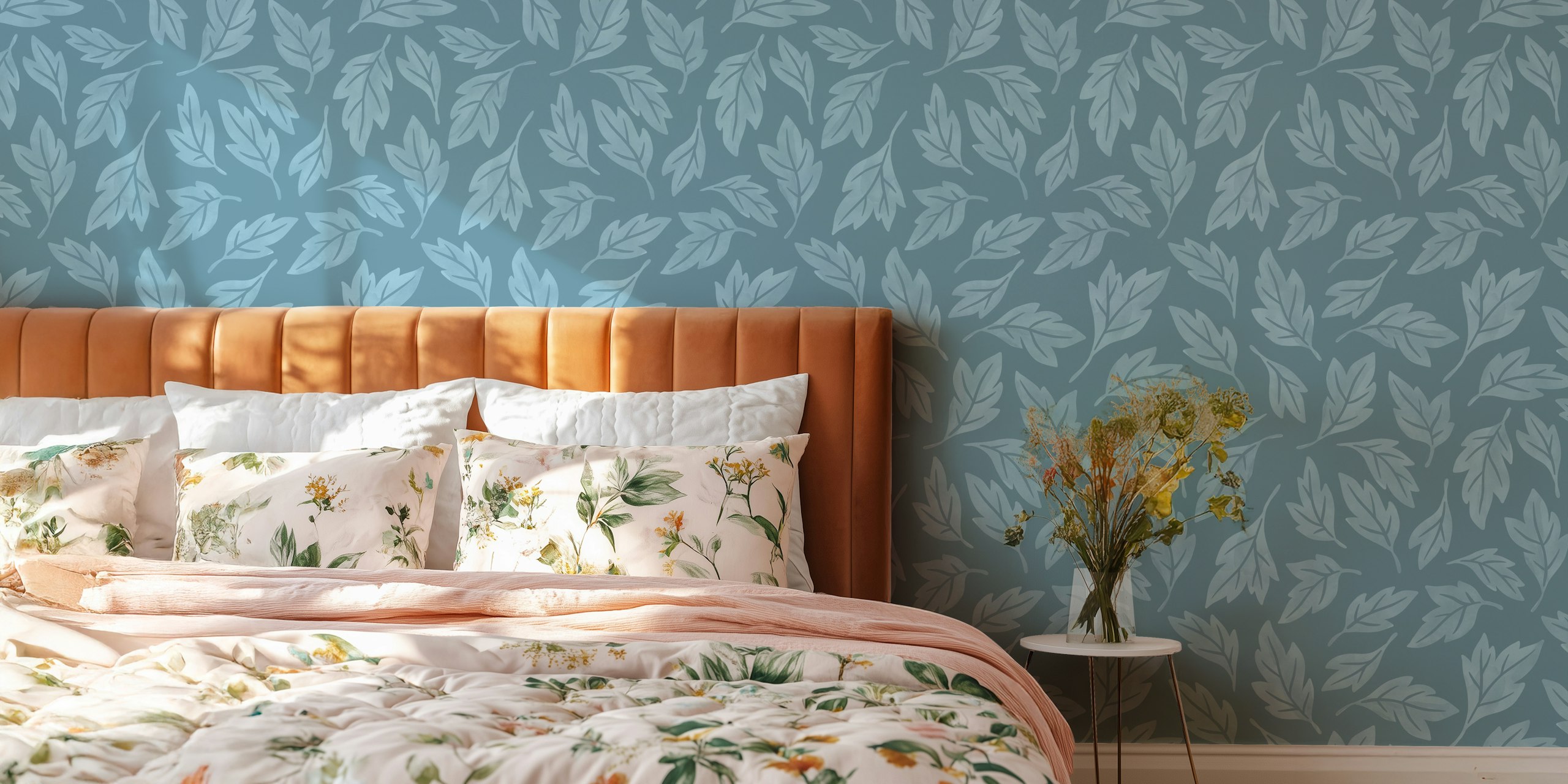 Blue leaves on a soft blue background wallpaper