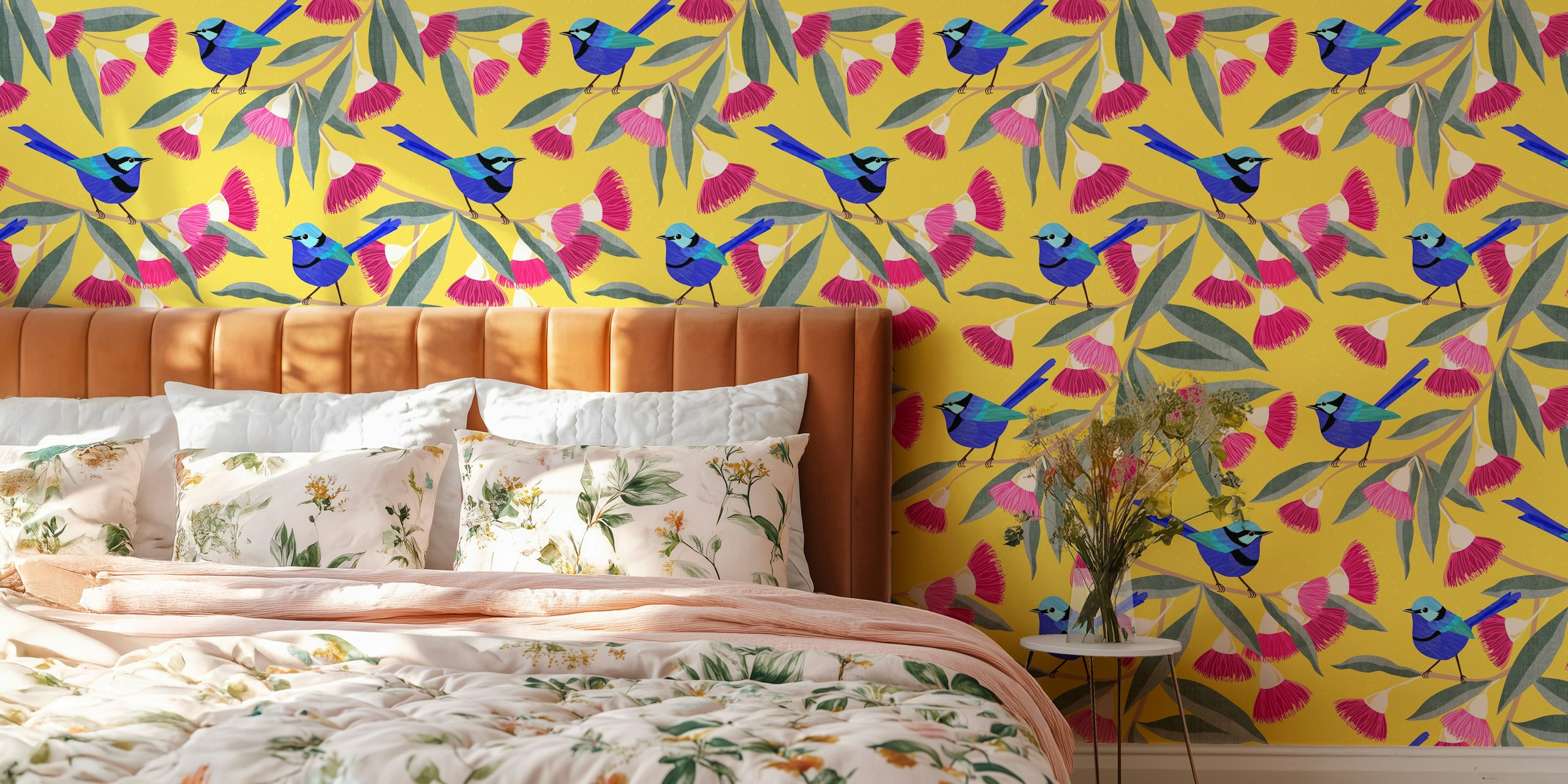 Colorful wallpaper featuring blue fairy wrens and pink eucalyptus flowers on a yellow background