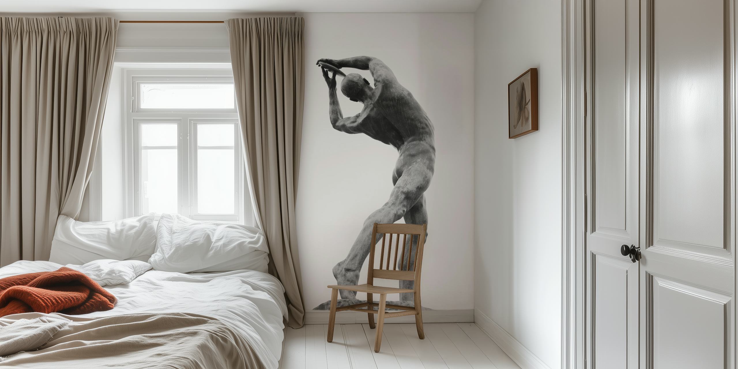 Athletic figure of a discus thrower in black and white wallpaper