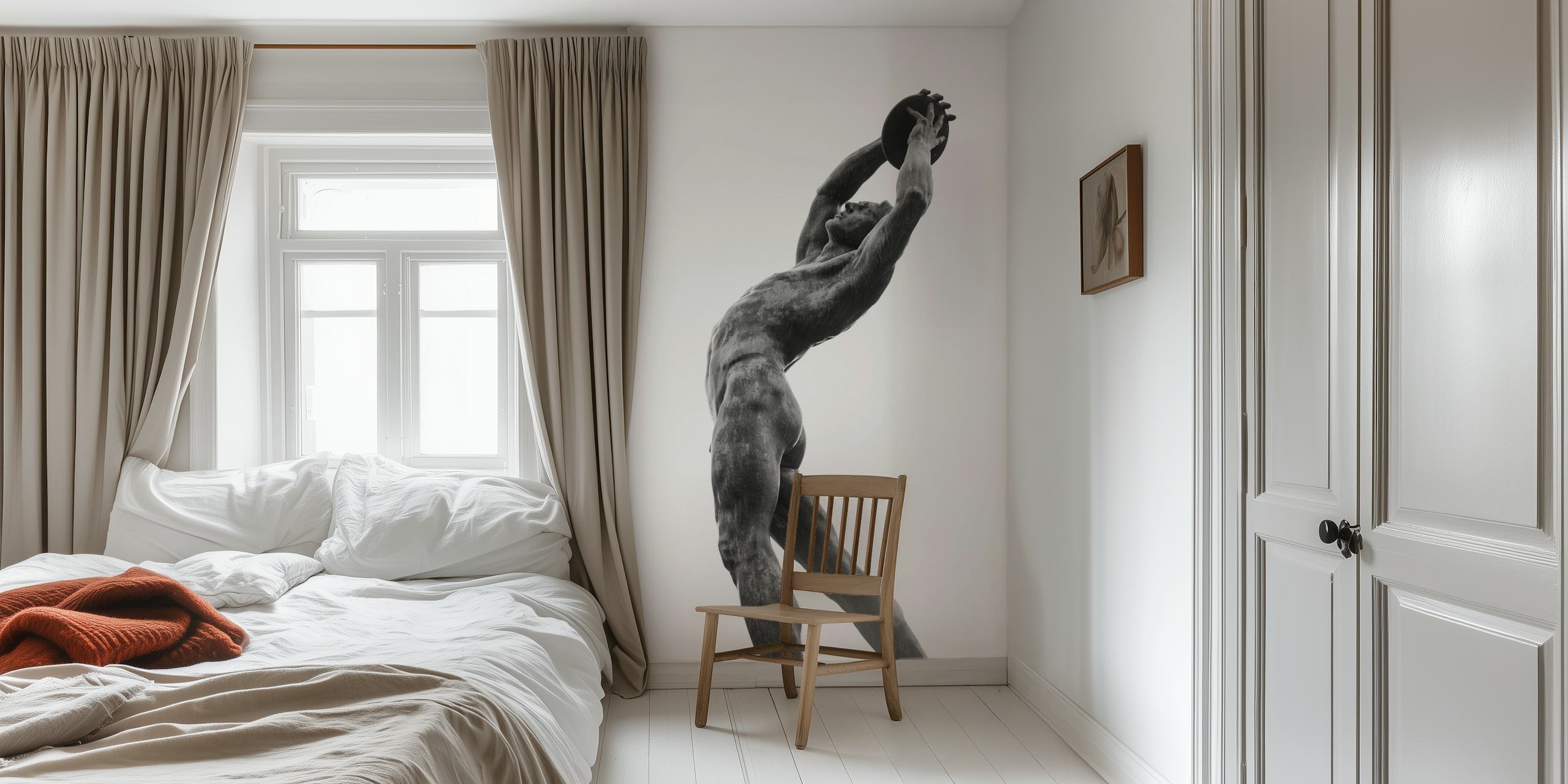 Black and white wallpaper with a muscular Olympic discus thrower silhouette