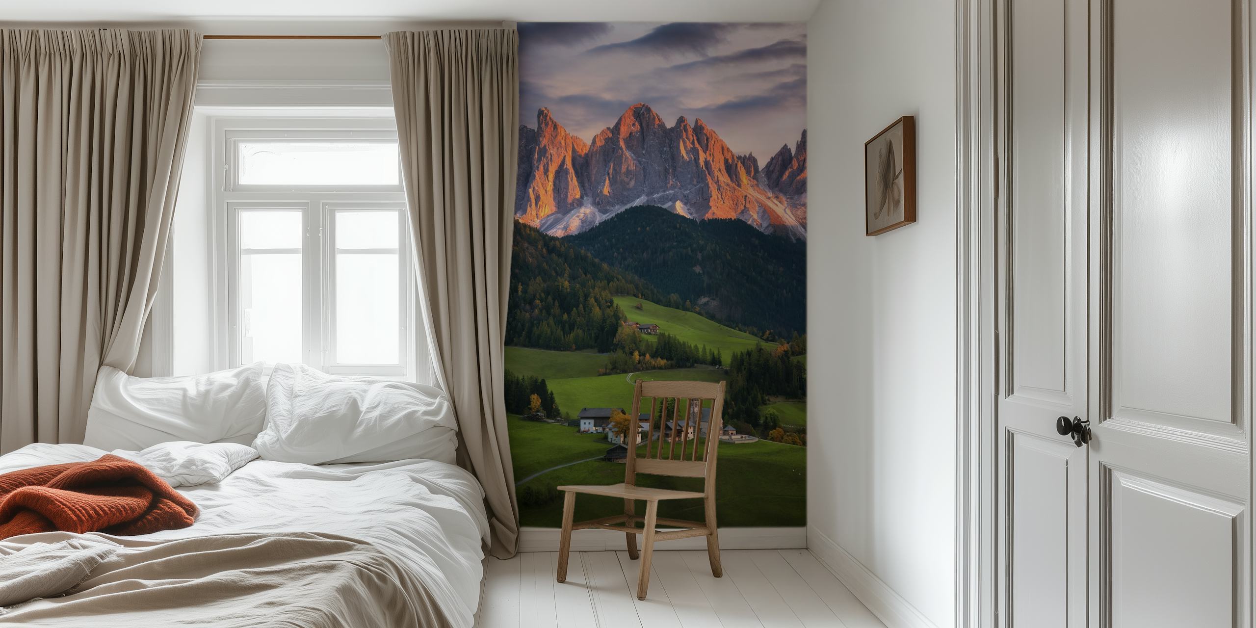 Mountain village with green fields and peaks wallpaper