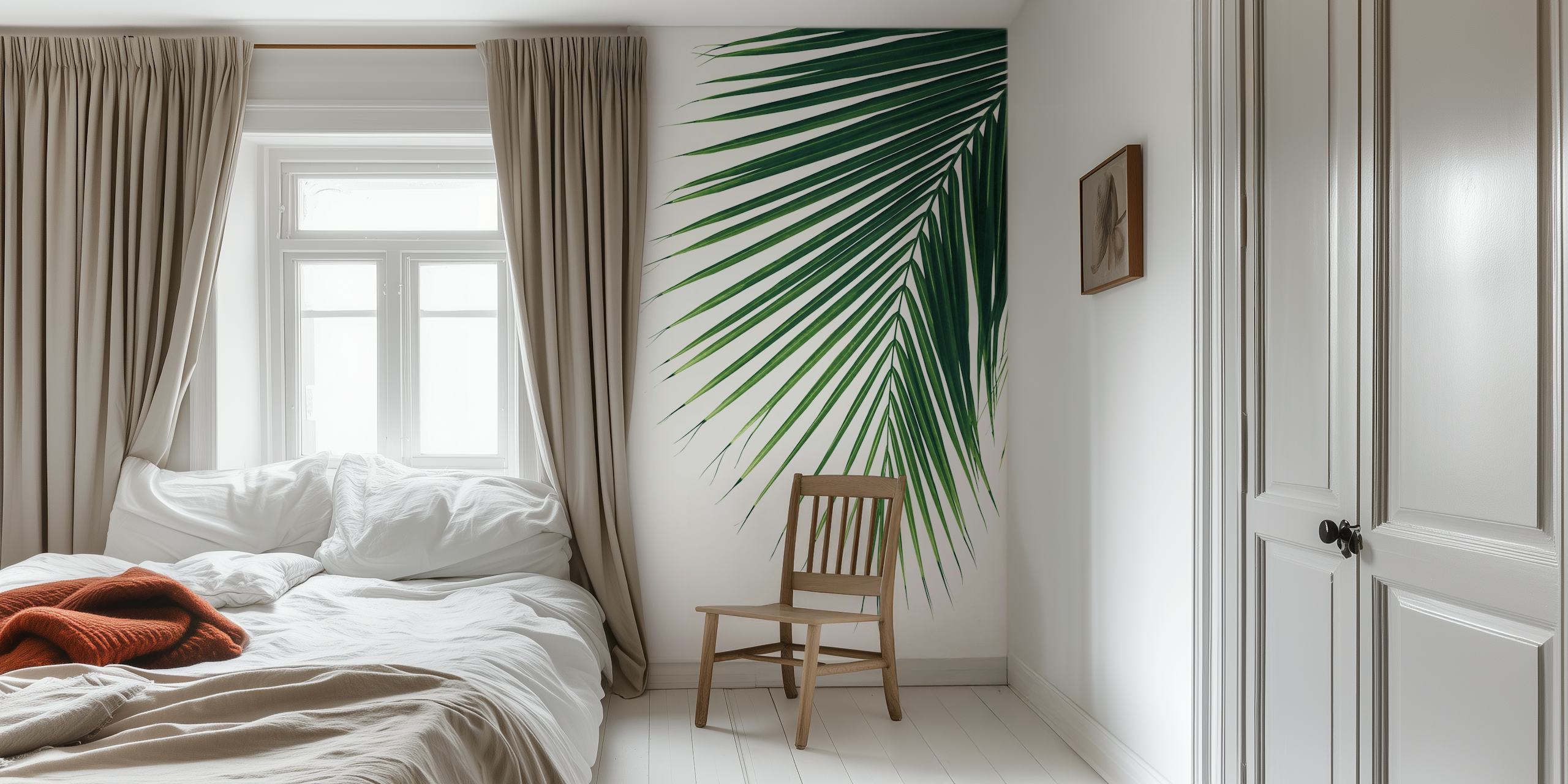 Tropical palm leaf design on a white background wallpaper