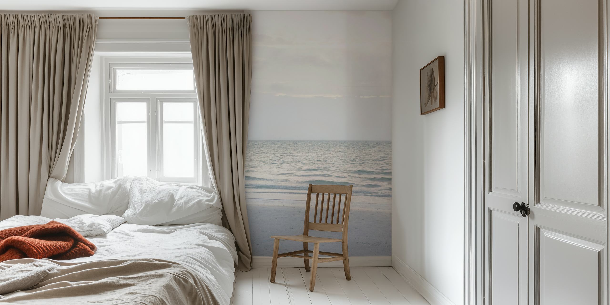 Tranquil sunrise over a calm sea wall mural