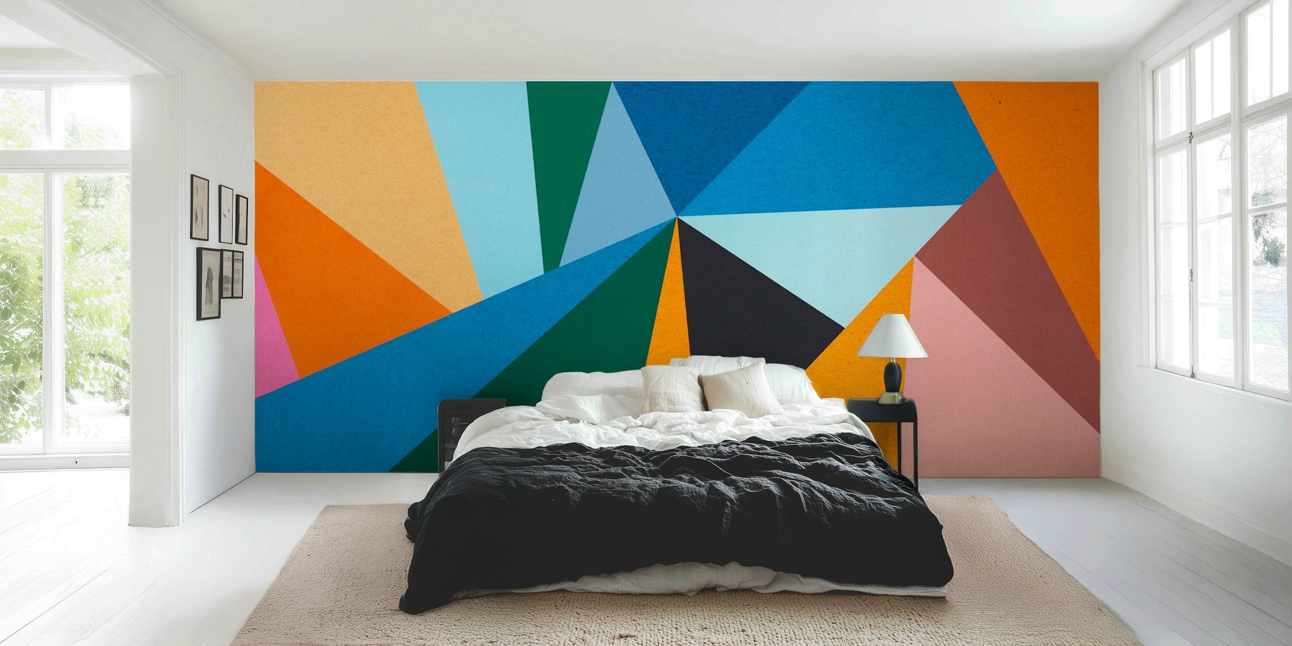 Geometric wallpaper featuring colorful triangular patterns in pink, orange, blue, green, and brown.