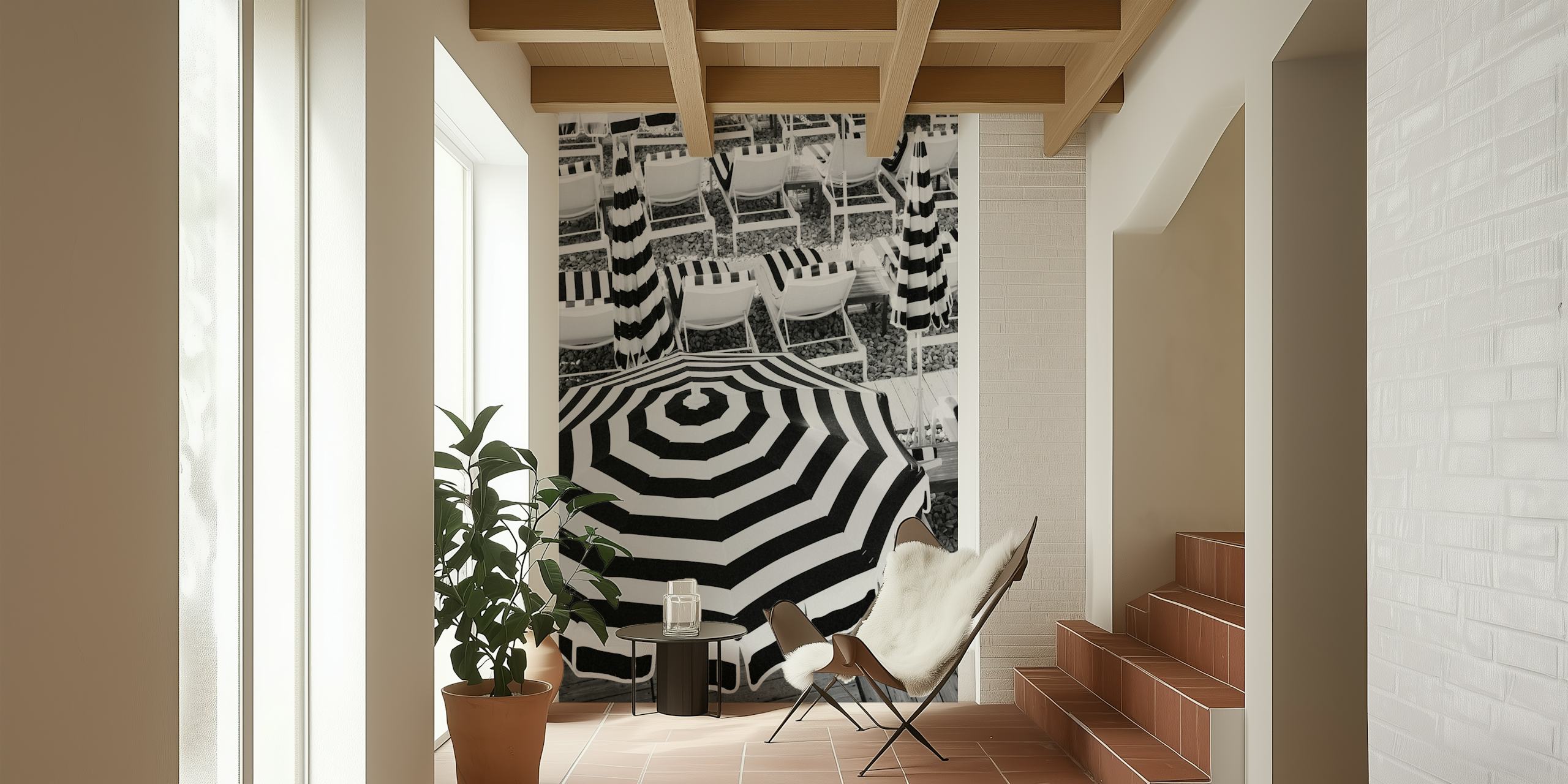 Monochrome wall mural featuring beach umbrellas and chairs in a striped pattern.