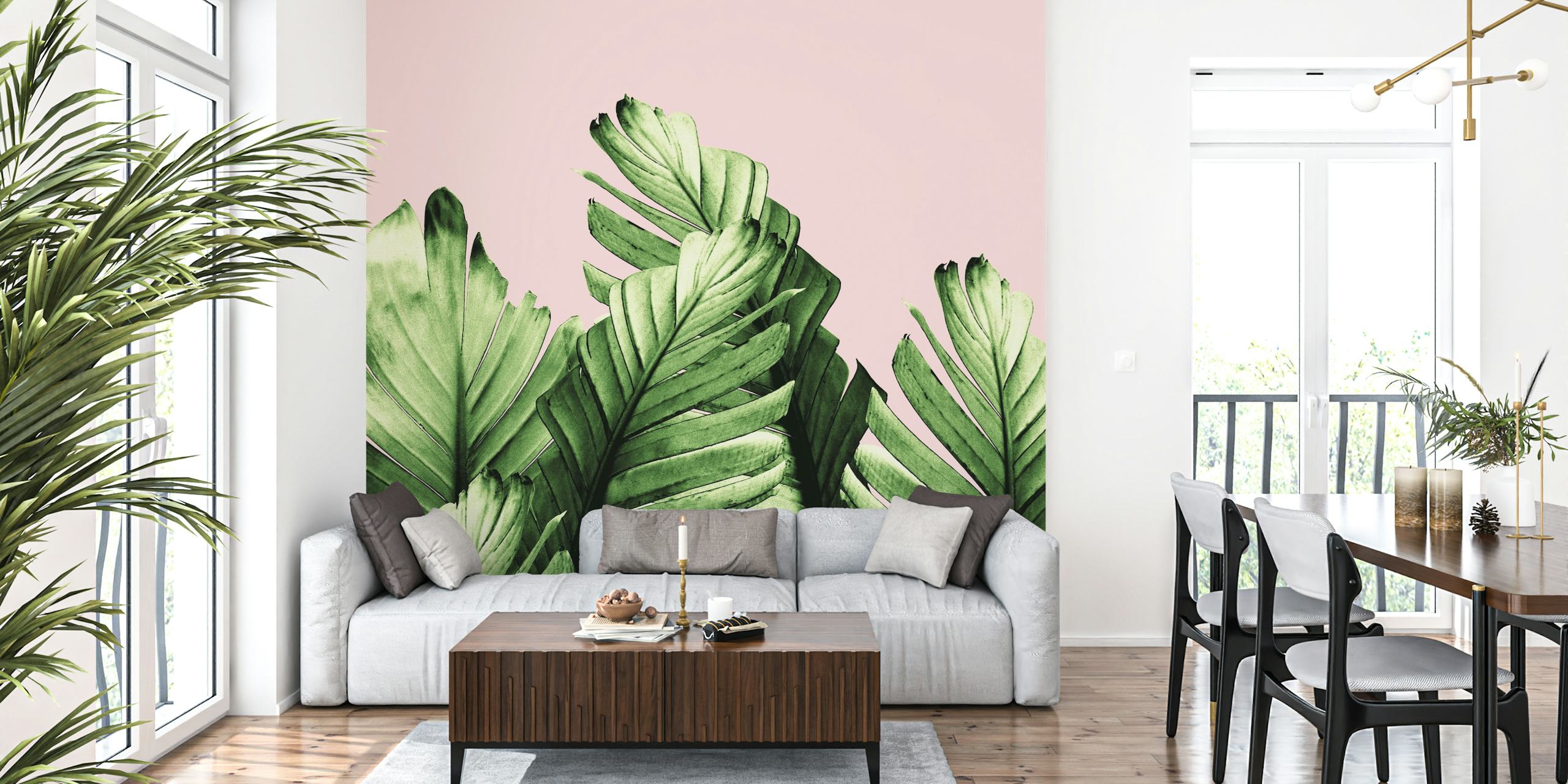 Green banana leaves on blush pink background wallpaper