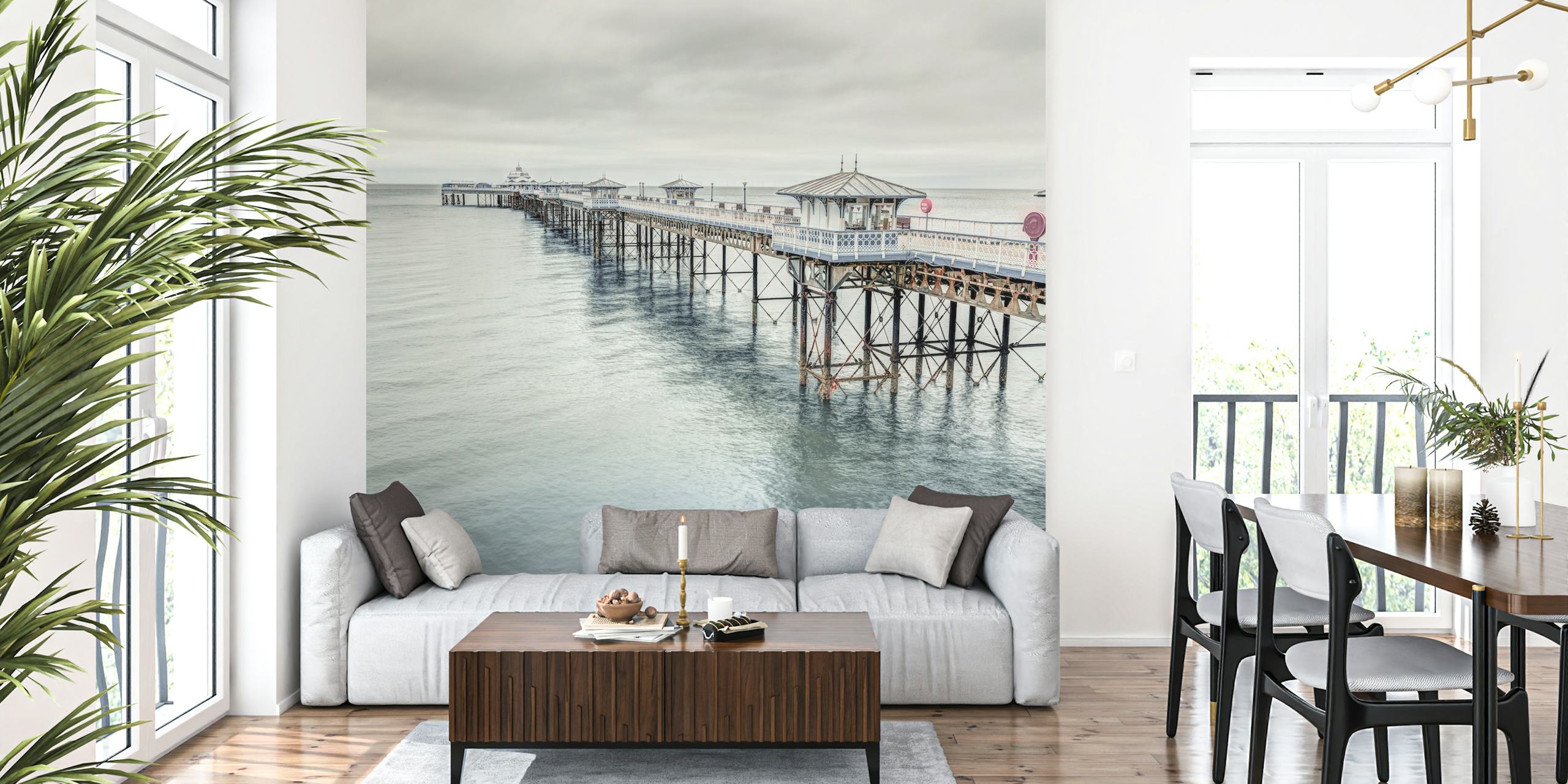 Coastal landscape wallpaper featuring Llandudno pier in muted greys and blues, realistic photography style.
