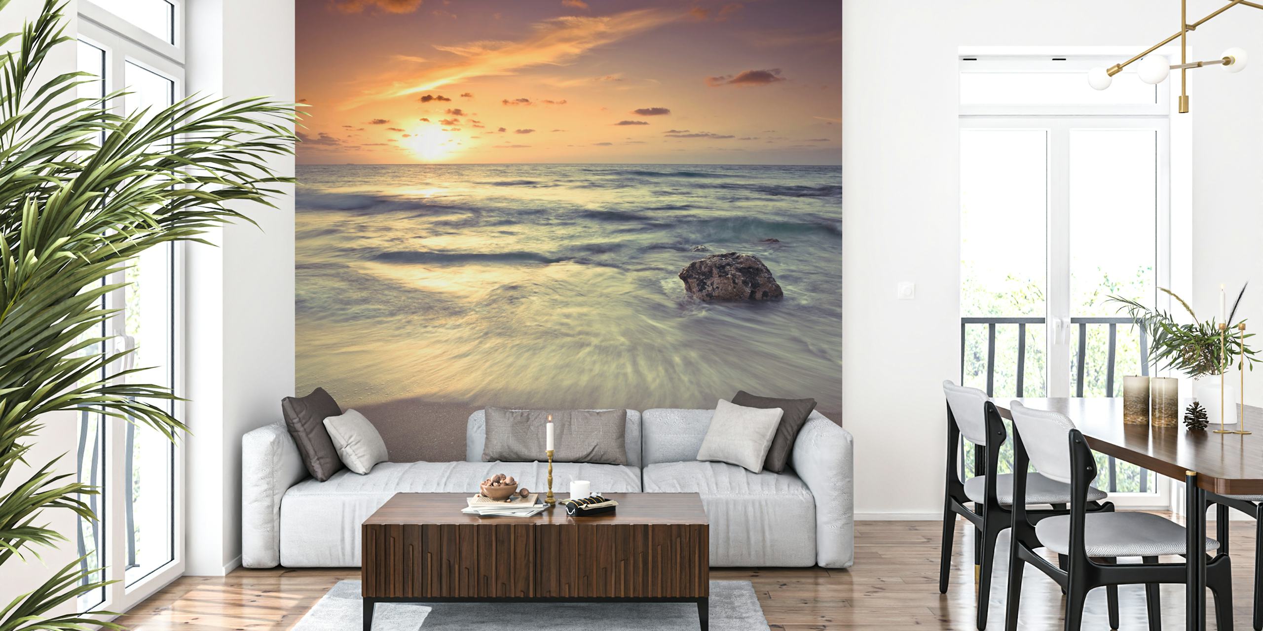 Beach sunset with waves and rock in golden hues wallpaper