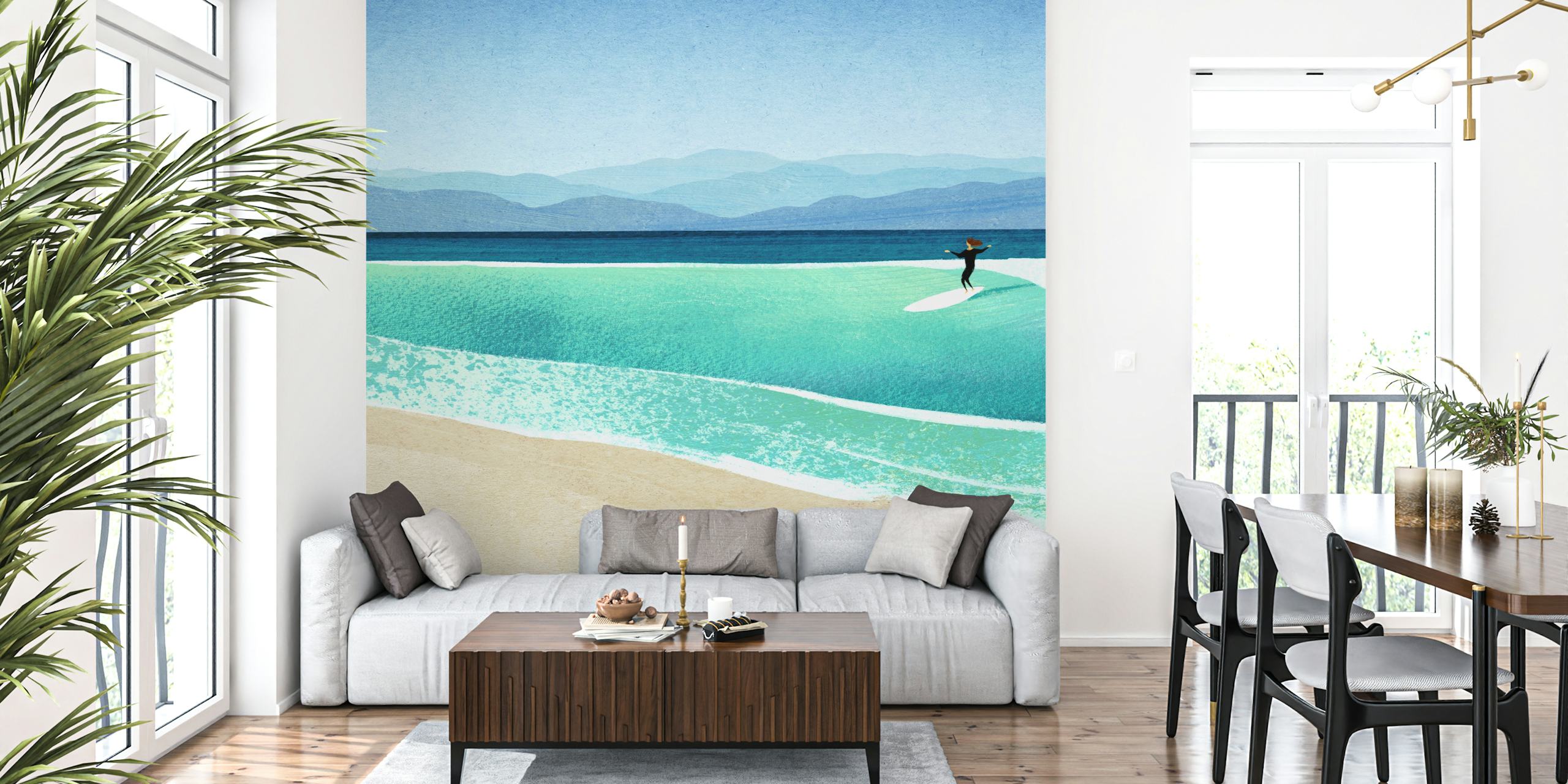 Mural de parede de uma surfista em uma praia imaculada com ondas azuis claras e montanhas distantes