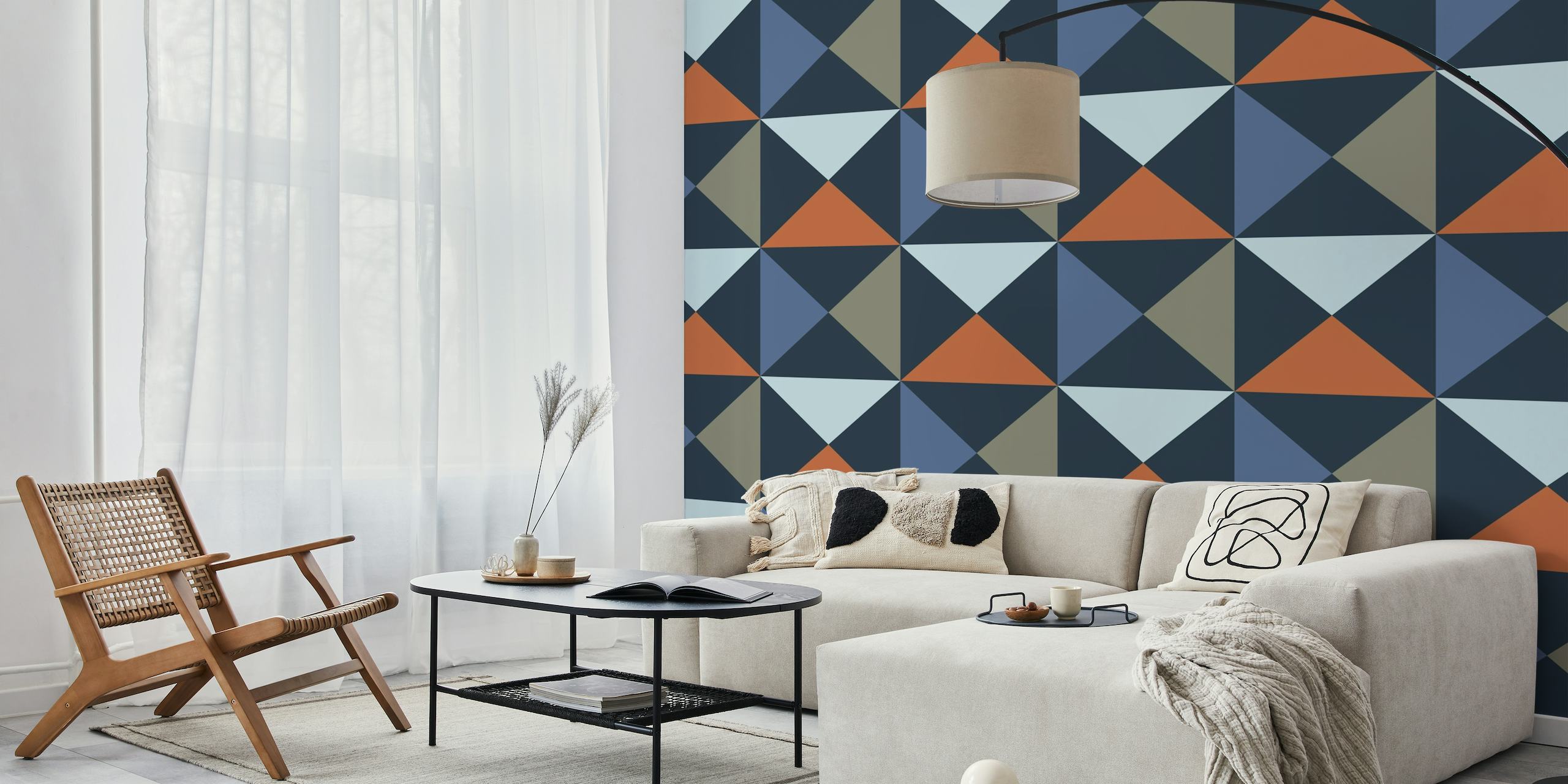 Abstract triangle pattern wall mural in shades of blue, rust, and grey.