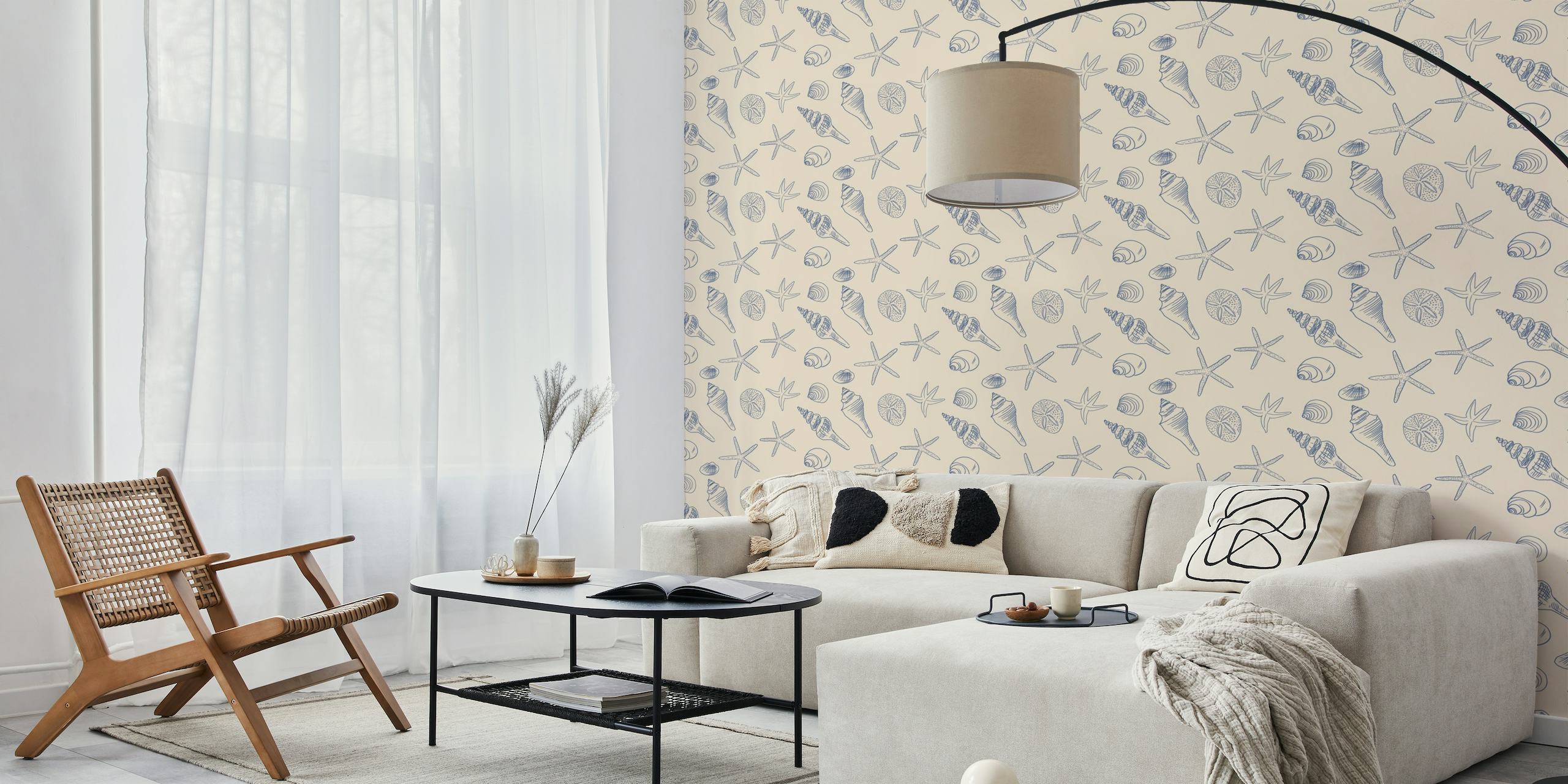 Illustration of seashells and starfish in blue and ivory tones on a wall mural