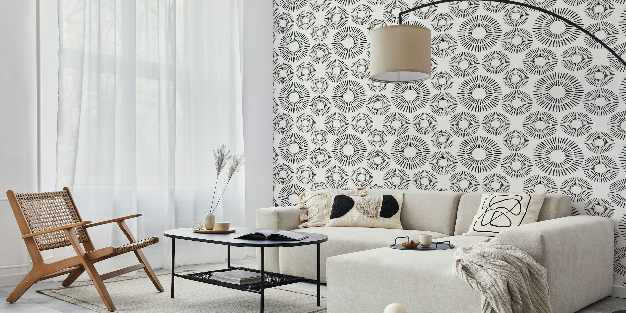 Black and white sun pattern wallpaper with circular designs and rays