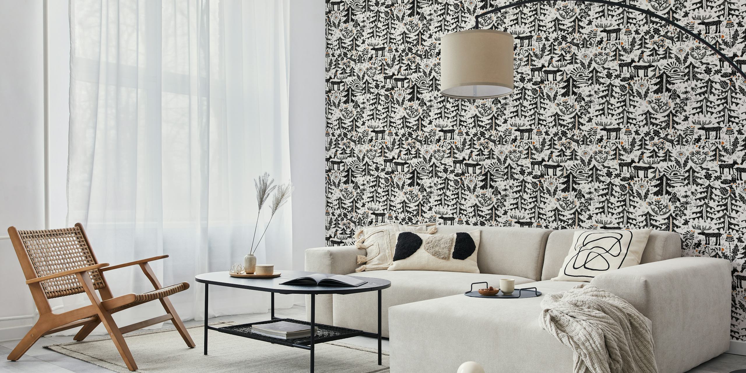 Nature-themed wallpaper featuring black trees, animals, and flowers with orange accents