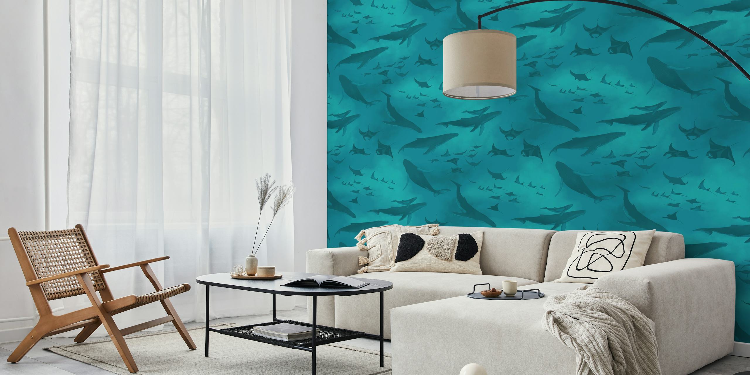 Teal ocean wallpaper with large whales and manta rays