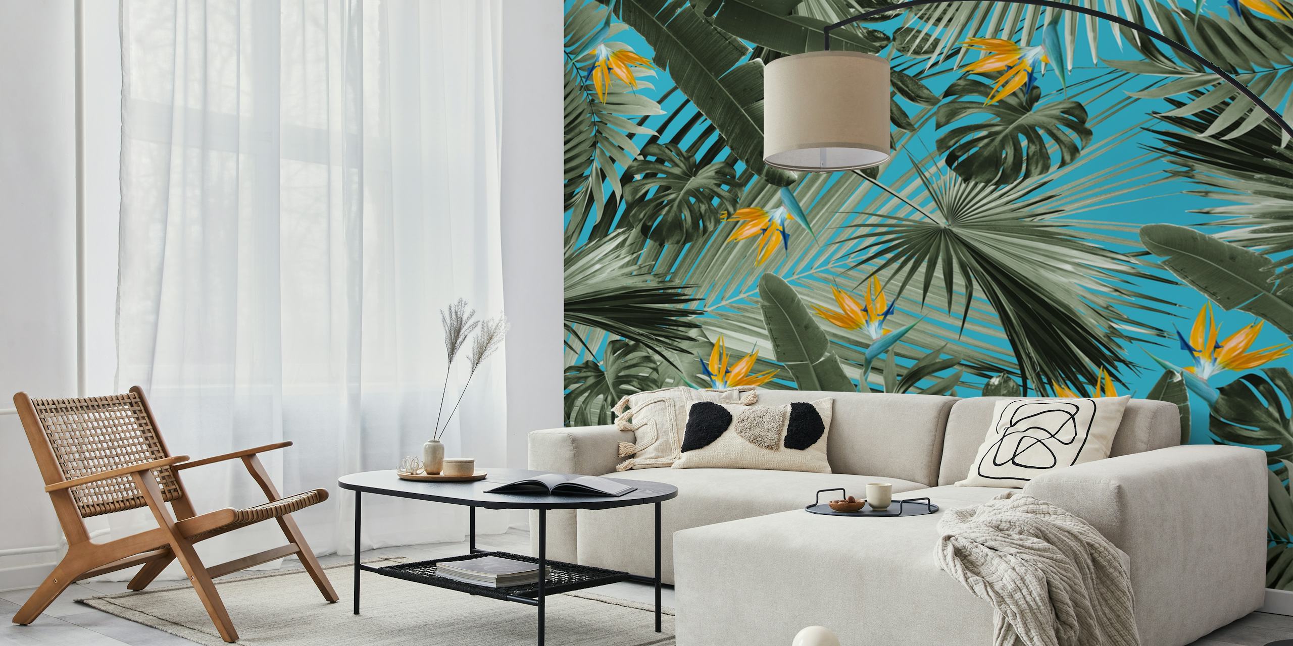 Tropical foliage with yellow birds of paradise on blue wallpaper