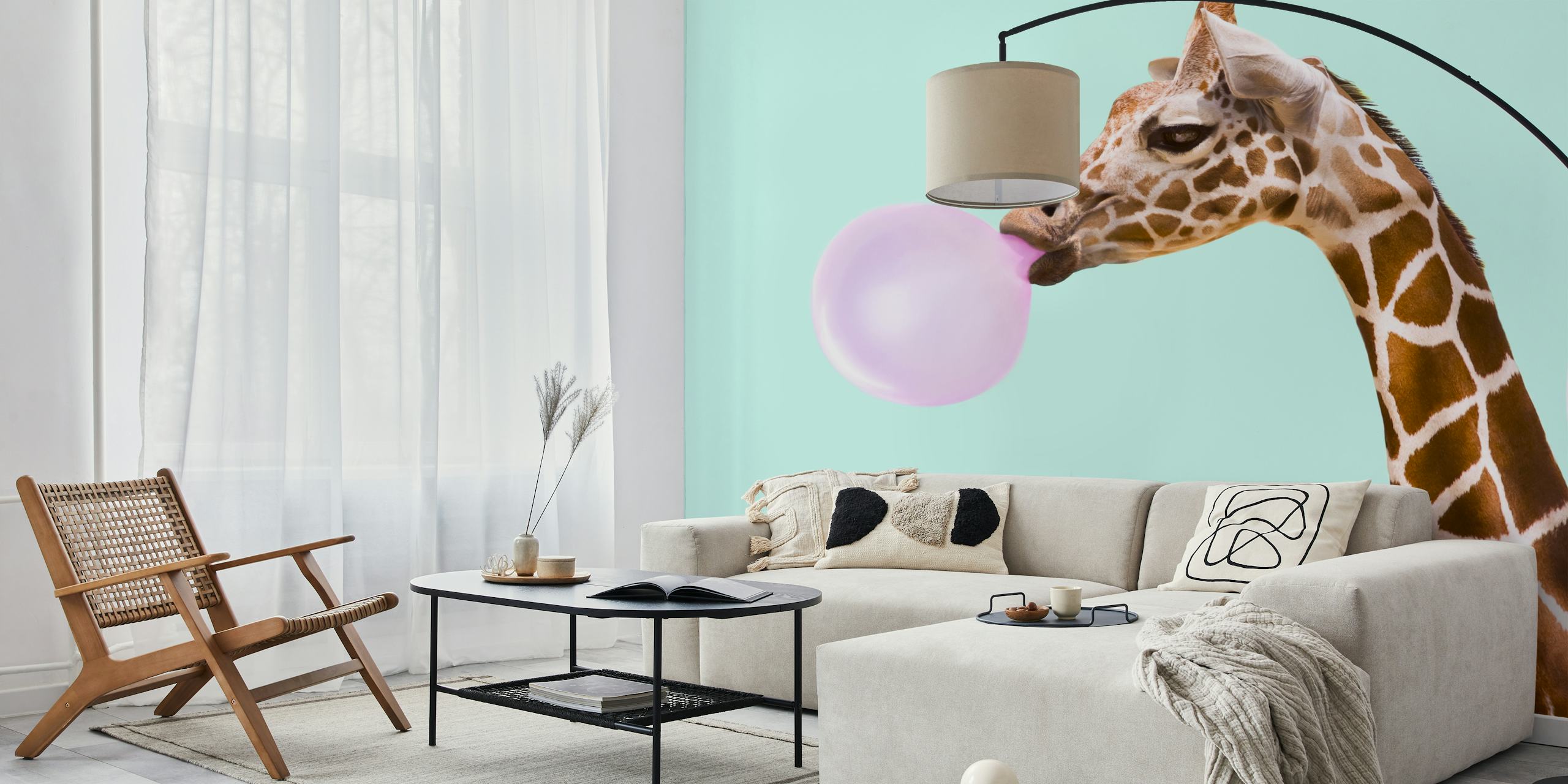 Giraffe blowing a pink bubblegum bubble against a mint green background wallpaper